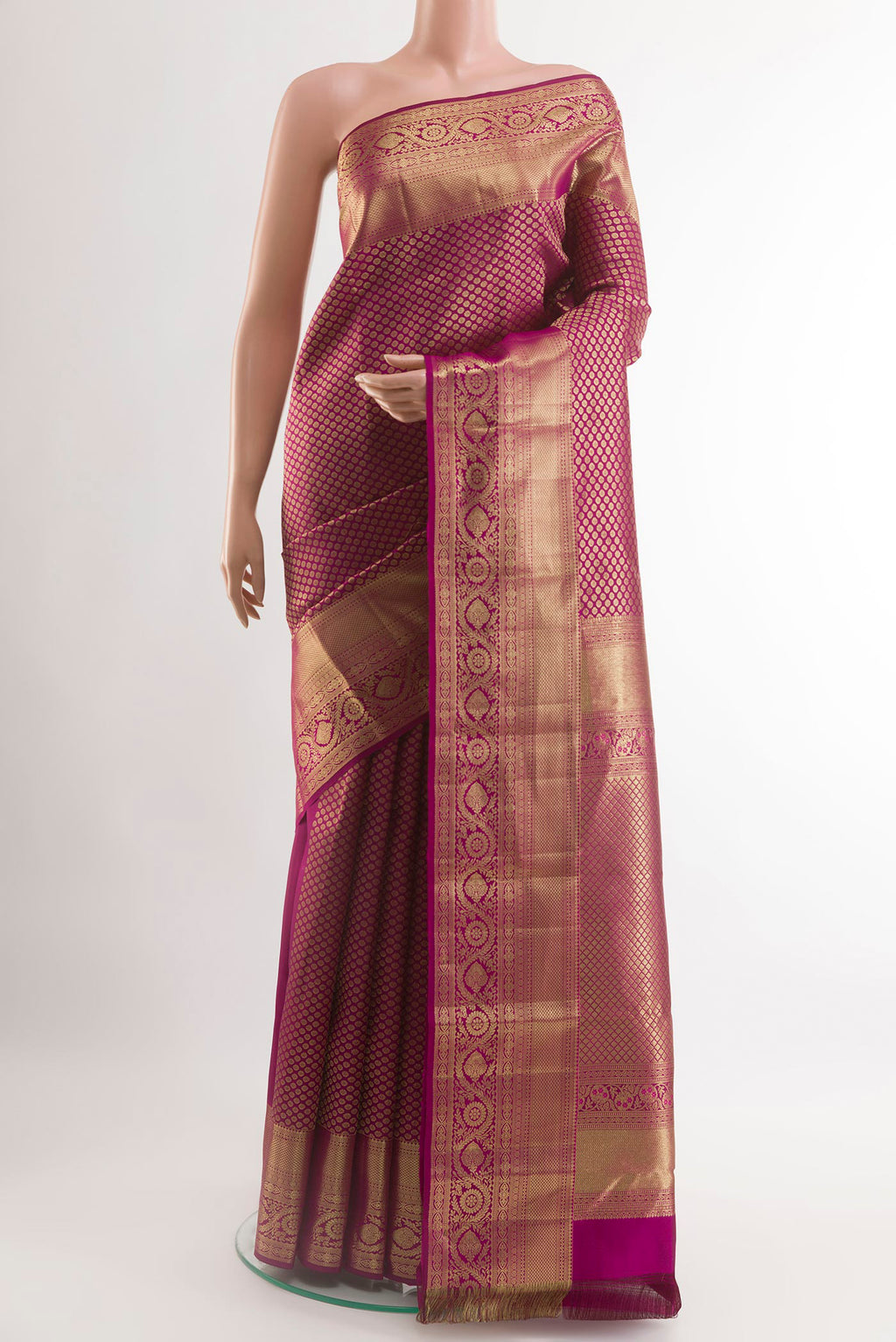 Purple Kanchipuram Silk Saree with Zari Brocade on the body and Zari Border.  displayed on a mannequin