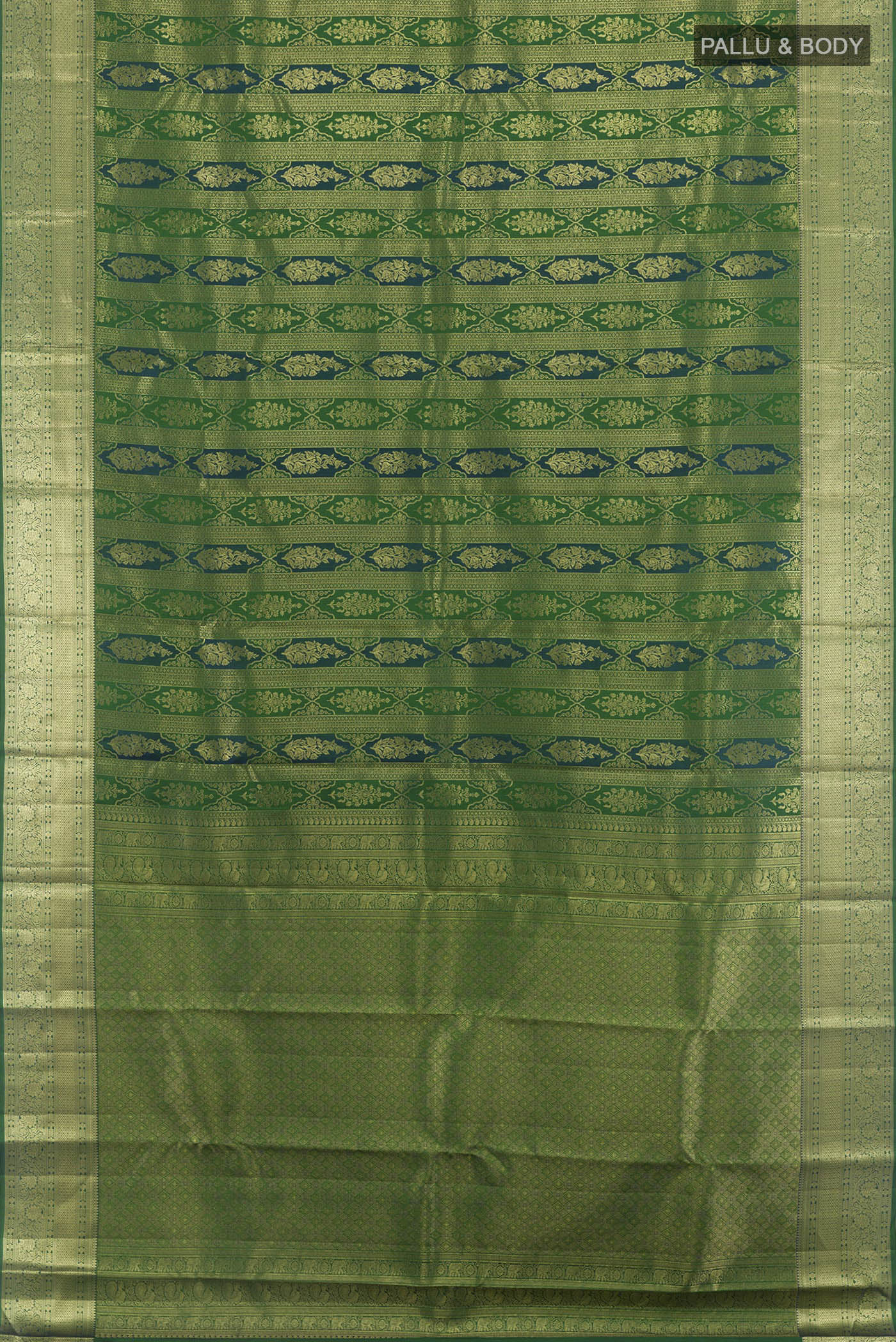 Flat view of Green Kanchipuram Silk Saree with Zari Brocade on the body and Zari Border. 