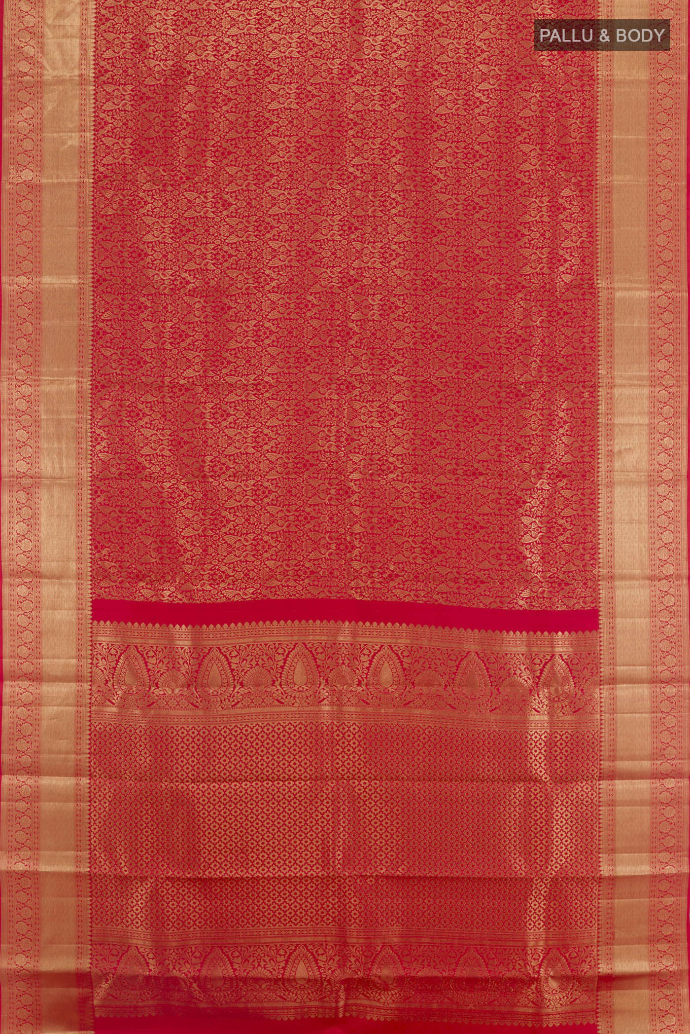 Flat view of Red Kanchipuram Silk Saree with Zari Brocade on the body and Zari Border. 