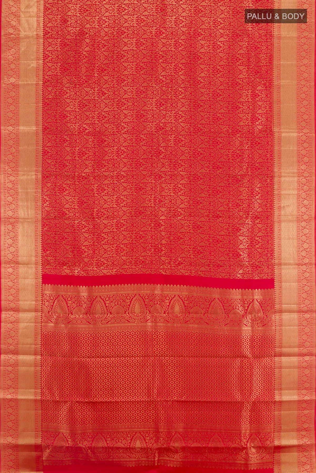 Flat view of Red Kanchipuram Silk Saree with Zari Brocade on the body and Zari Border. 