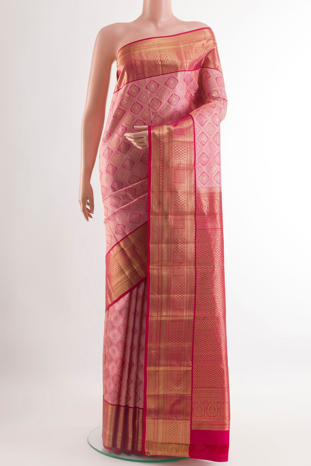 Pink Kanchipuram Silk Saree with Zari Brocade on the body and Zari Border.  displayed on a mannequin