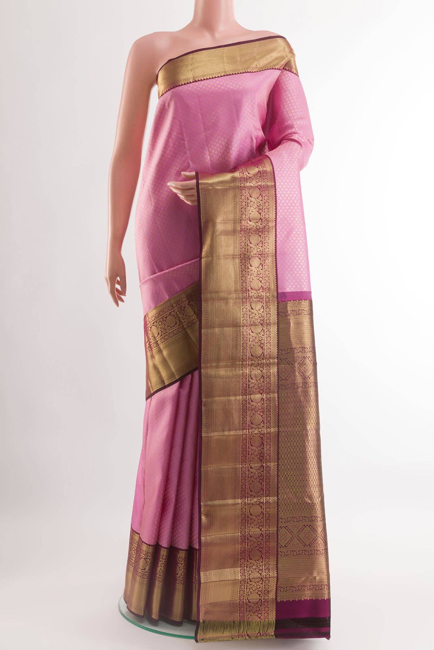 Pink Kanchipuram Silk Saree with Zari Brocade on the body and Zari Border.  displayed on a mannequin