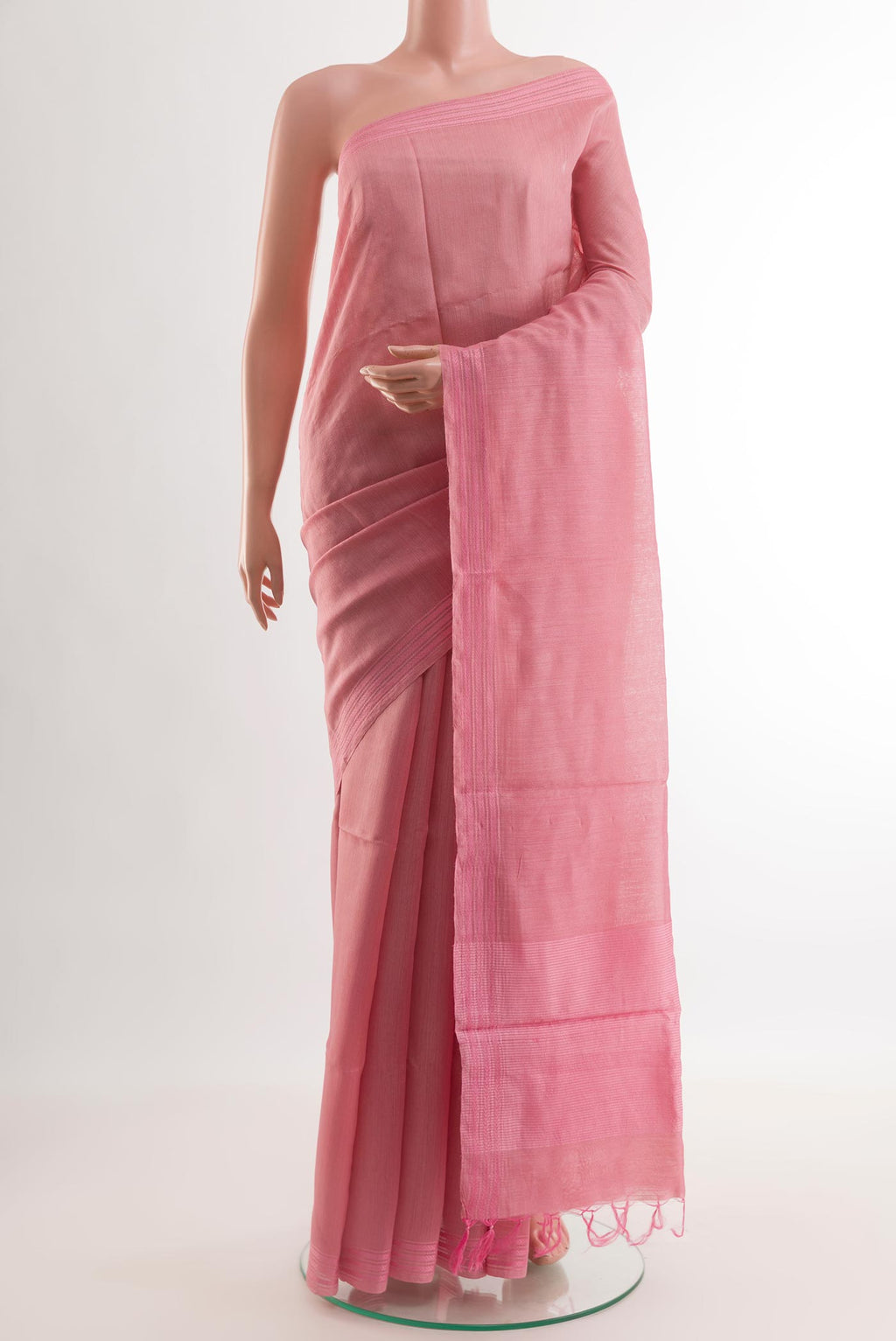 Pink Tussar Silk Saree with Plain Body and Zari Border.  displayed on a mannequin