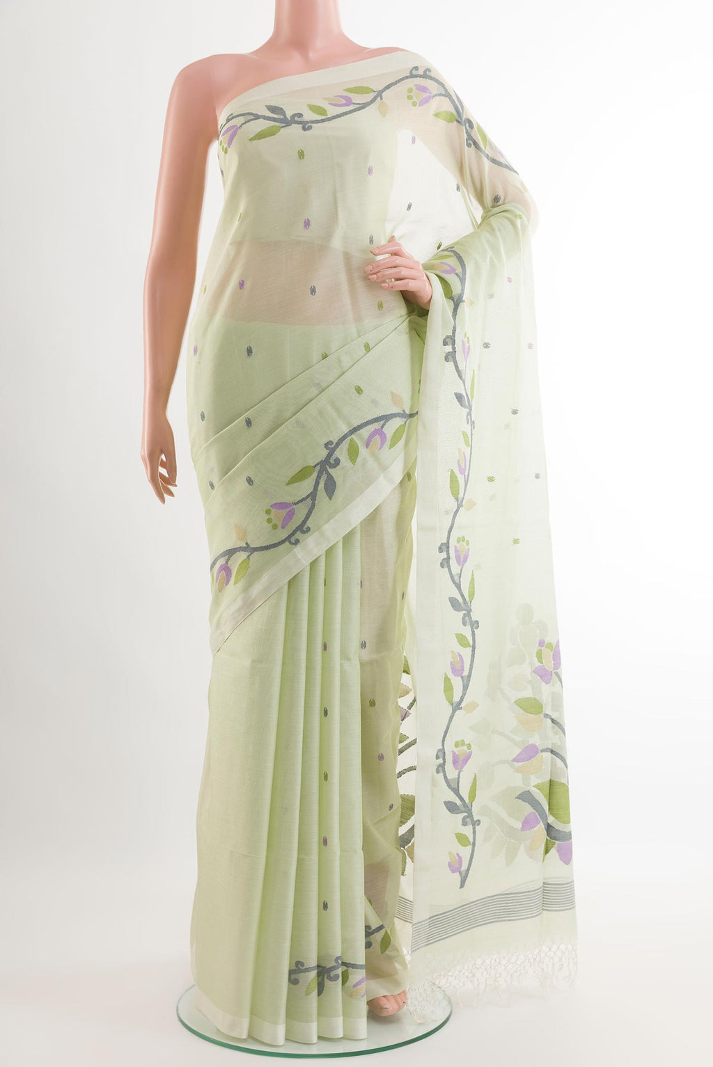 Mint Green Mul Cotton Saree with Embroidery on the body and Plain Border.  displayed on a mannequin
