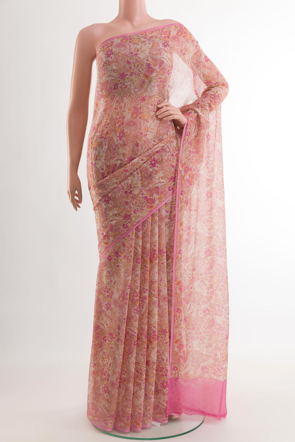 Pink Chiffon Saree with Printed design on the body and Plain Border.  displayed on a mannequin