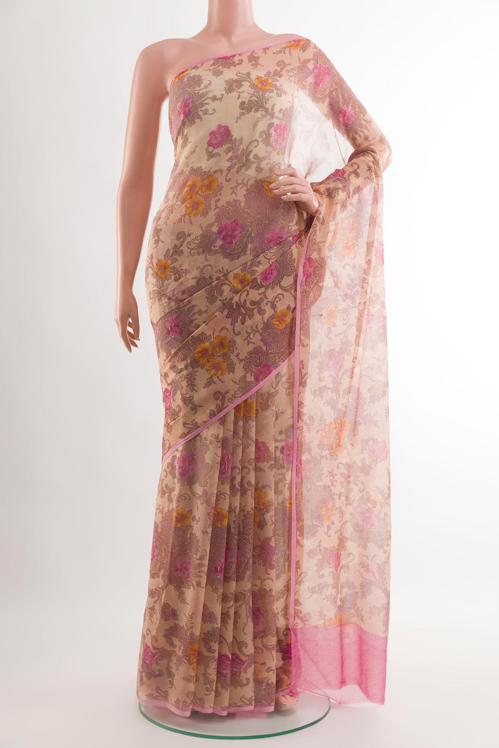 Beige Chiffon Saree with Printed design on the body and Plain Border.  displayed on a mannequin