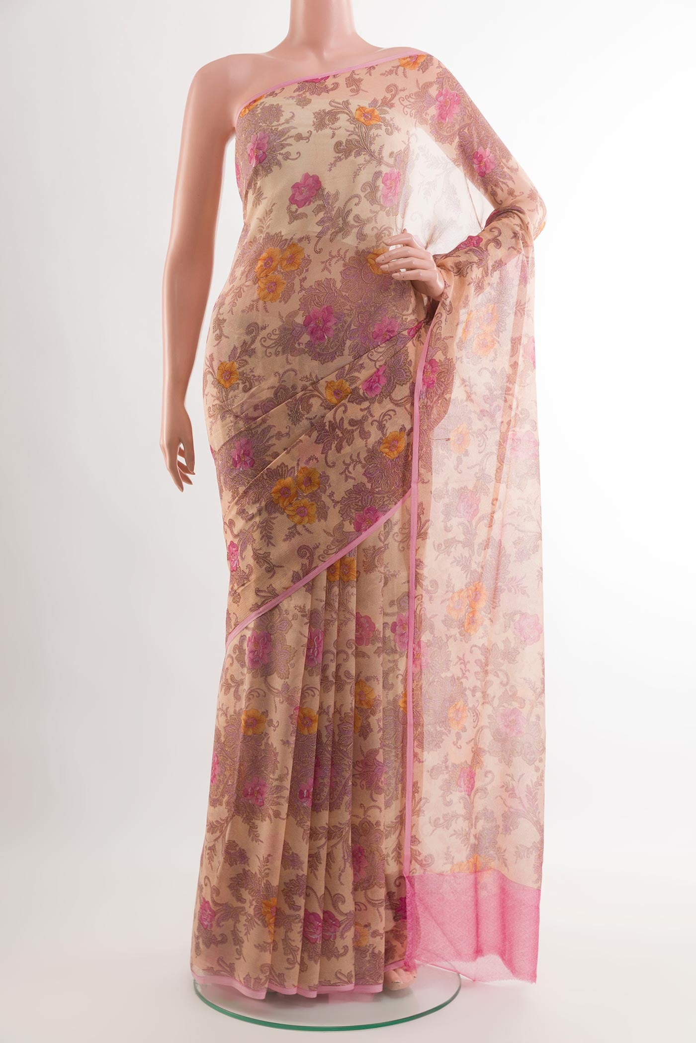 Beige Chiffon Saree with Printed design on the body and Plain Border.  displayed on a mannequin