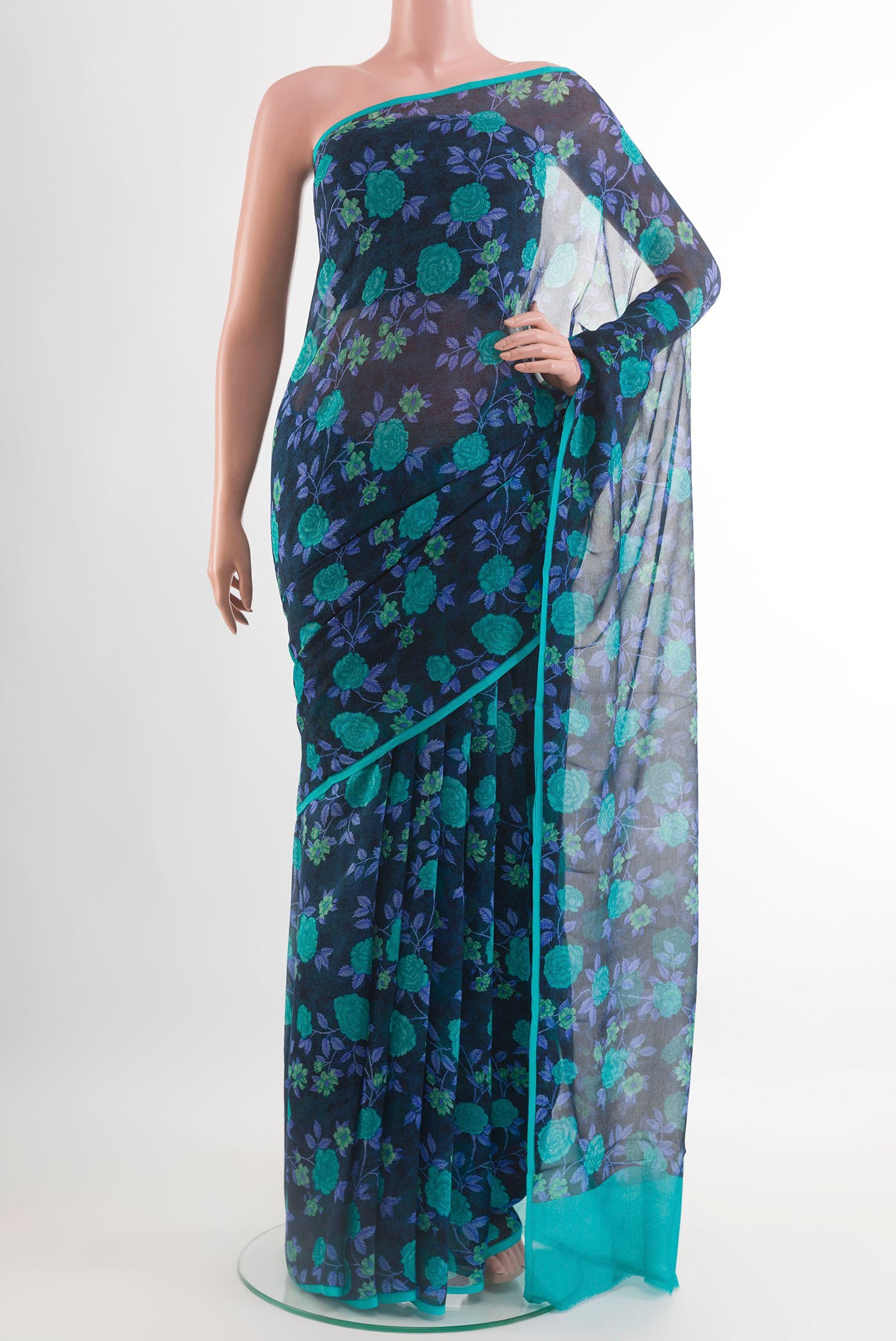 Dark Blue Mysore Chiffon Saree with Printed design on the body and Plain Border.  displayed on a mannequin