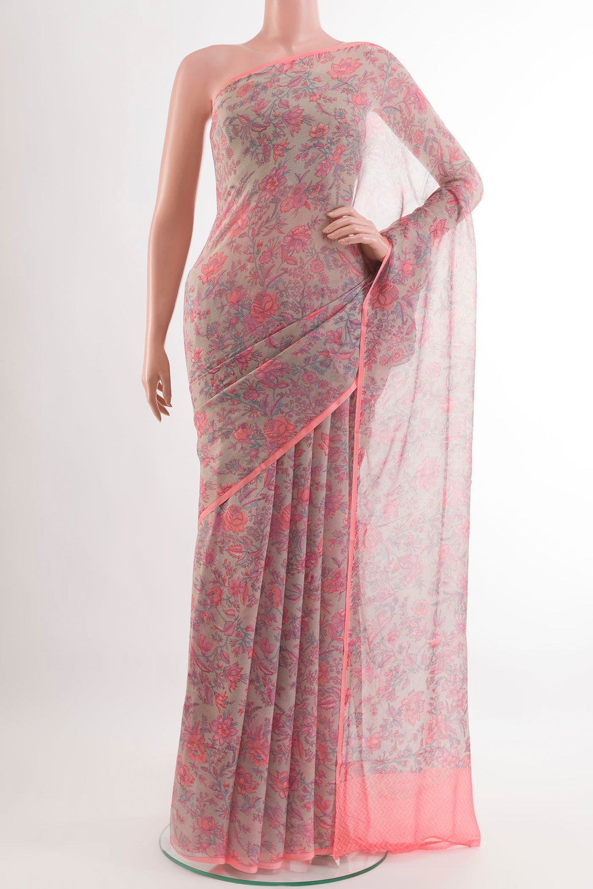 Grey Mysore Chiffon Saree with Printed design on the body and Plain Border.  displayed on a mannequin