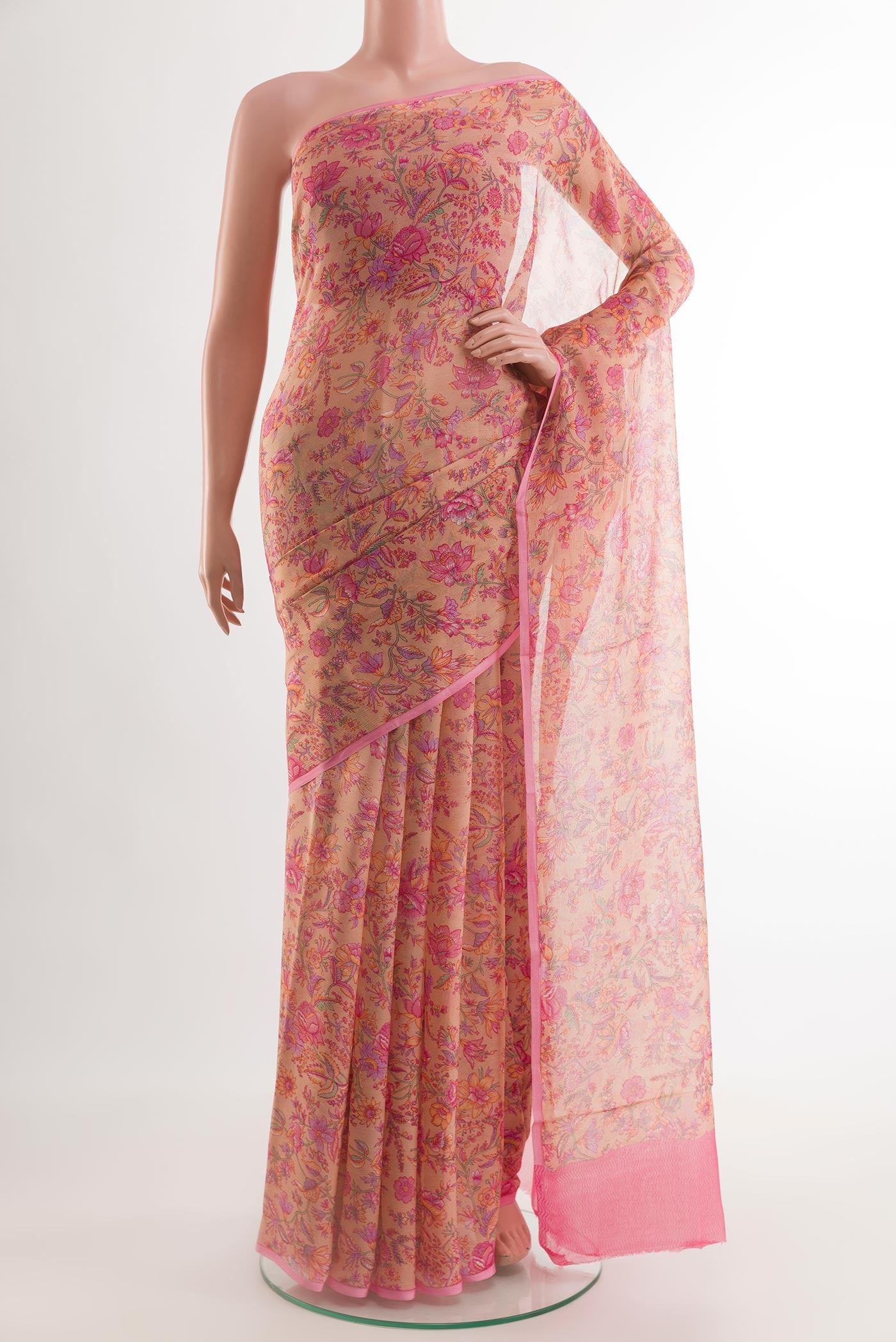 Beige Chiffon Saree with Printed design on the body and Plain Border.  displayed on a mannequin