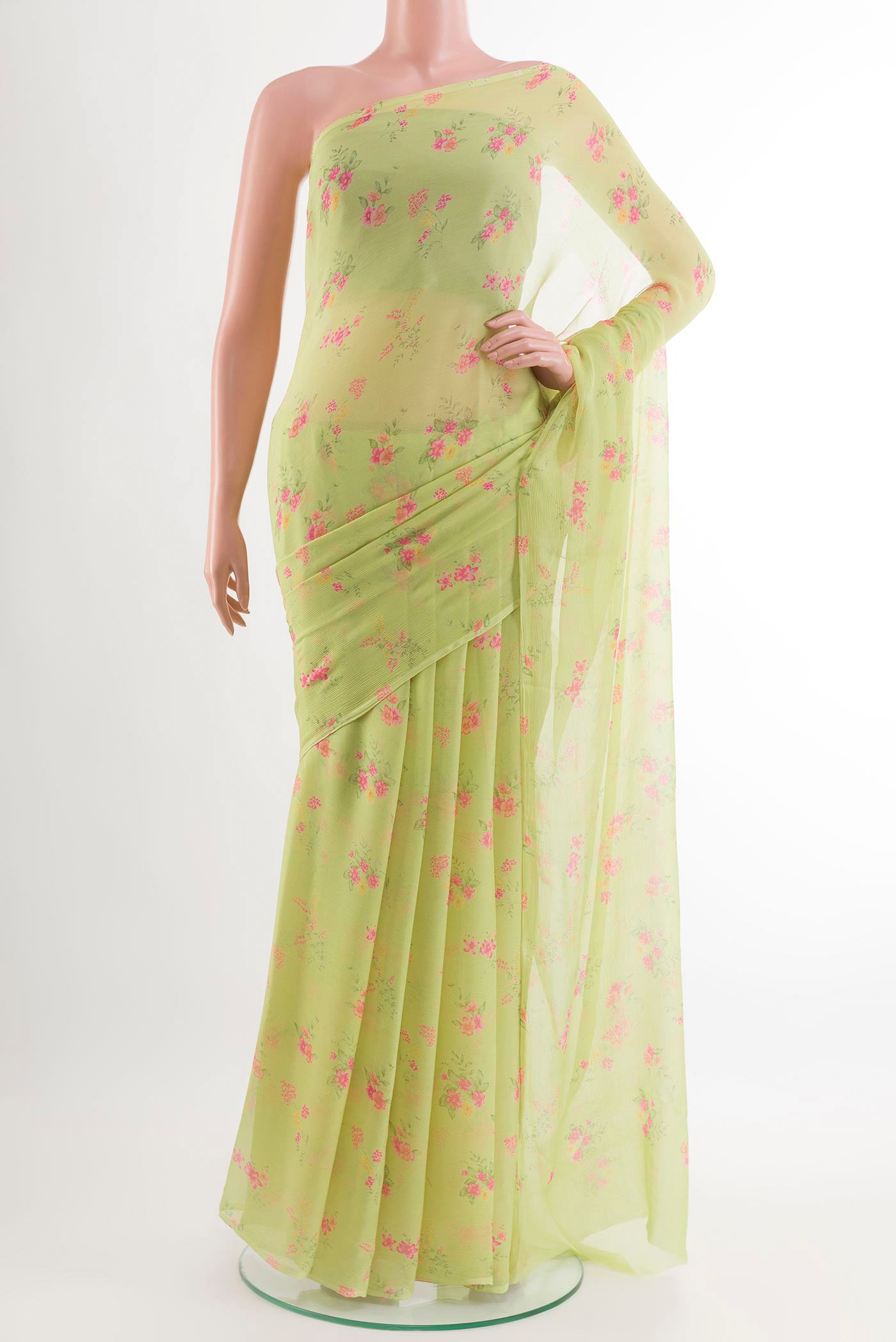 Light Green Mysore Chiffon Saree with Printed design on the body and Plain Border.  displayed on a mannequin
