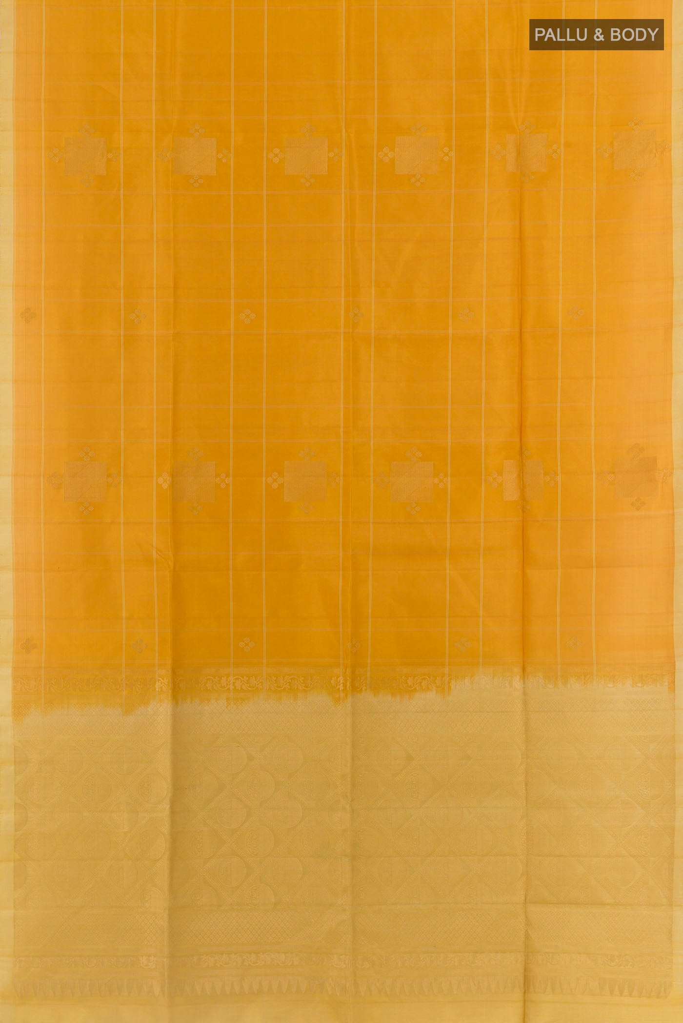 Flat view of Yellow Soft Silk Saree with Zari Butta on the body and Zari Border. 