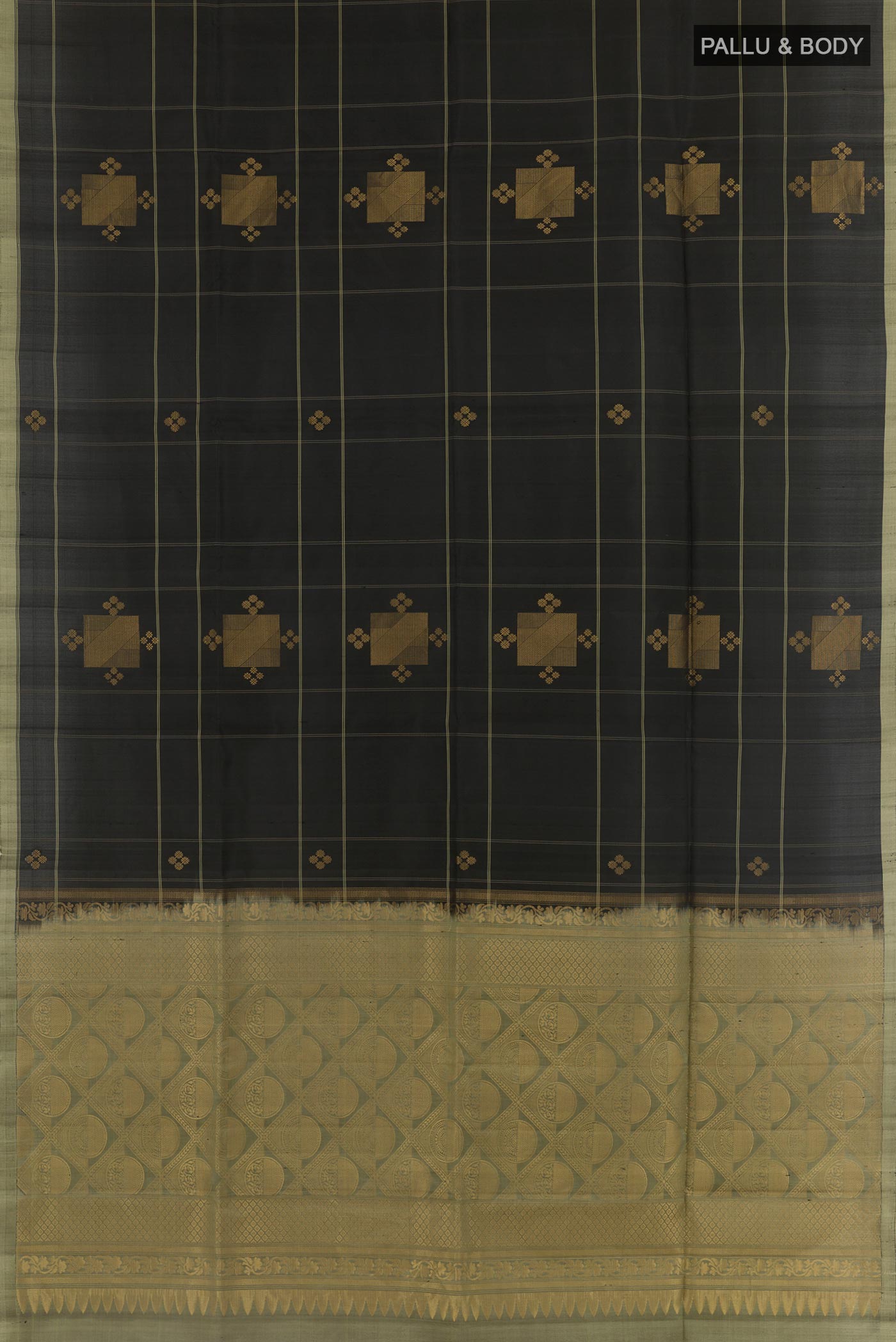 Flat view of Black Soft Silk Saree with Zari Butta on the body and Zari Border. 