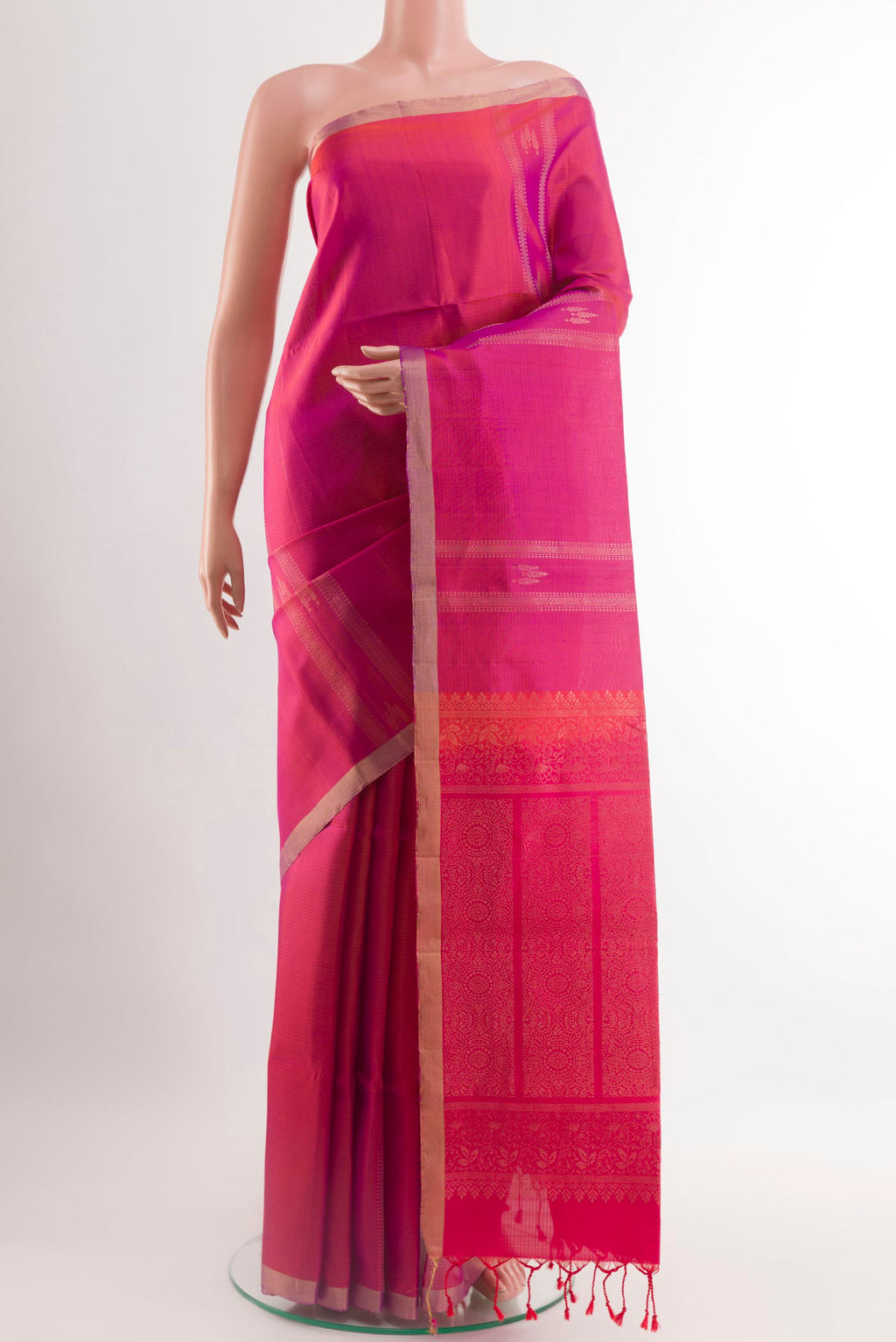 Pink Soft Silk Saree with Zari Butta on the body and Zari Border.  displayed on a mannequin
