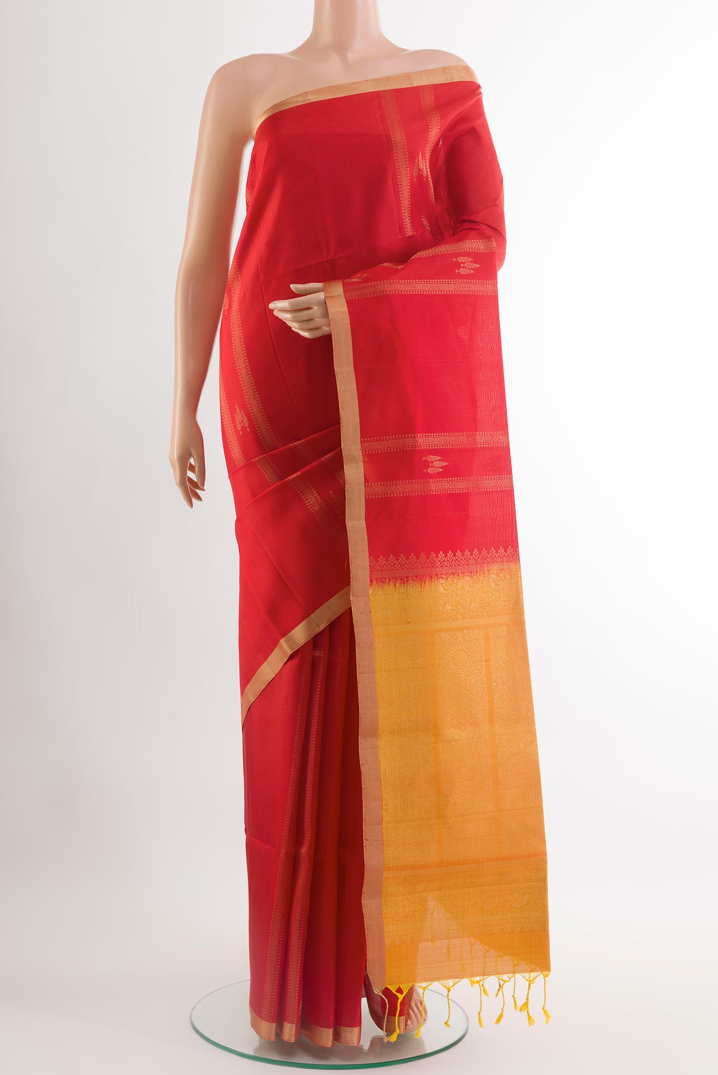 Red Soft Silk Saree with Stripes on the body and Zari Border.  displayed on a mannequin