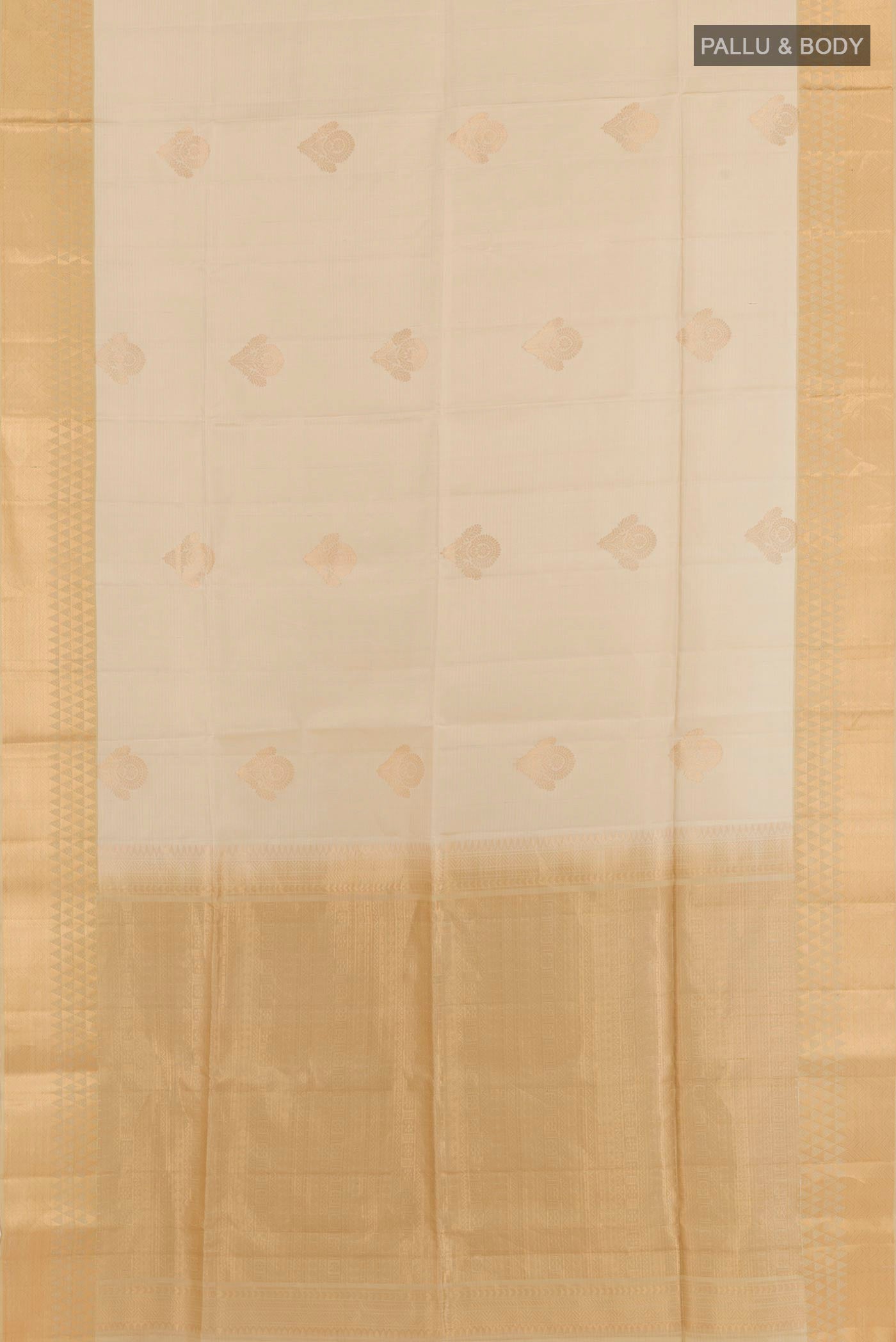 Flat view of Cream Soft Silk Saree with Zari Butta on the body and Zari Border. 
