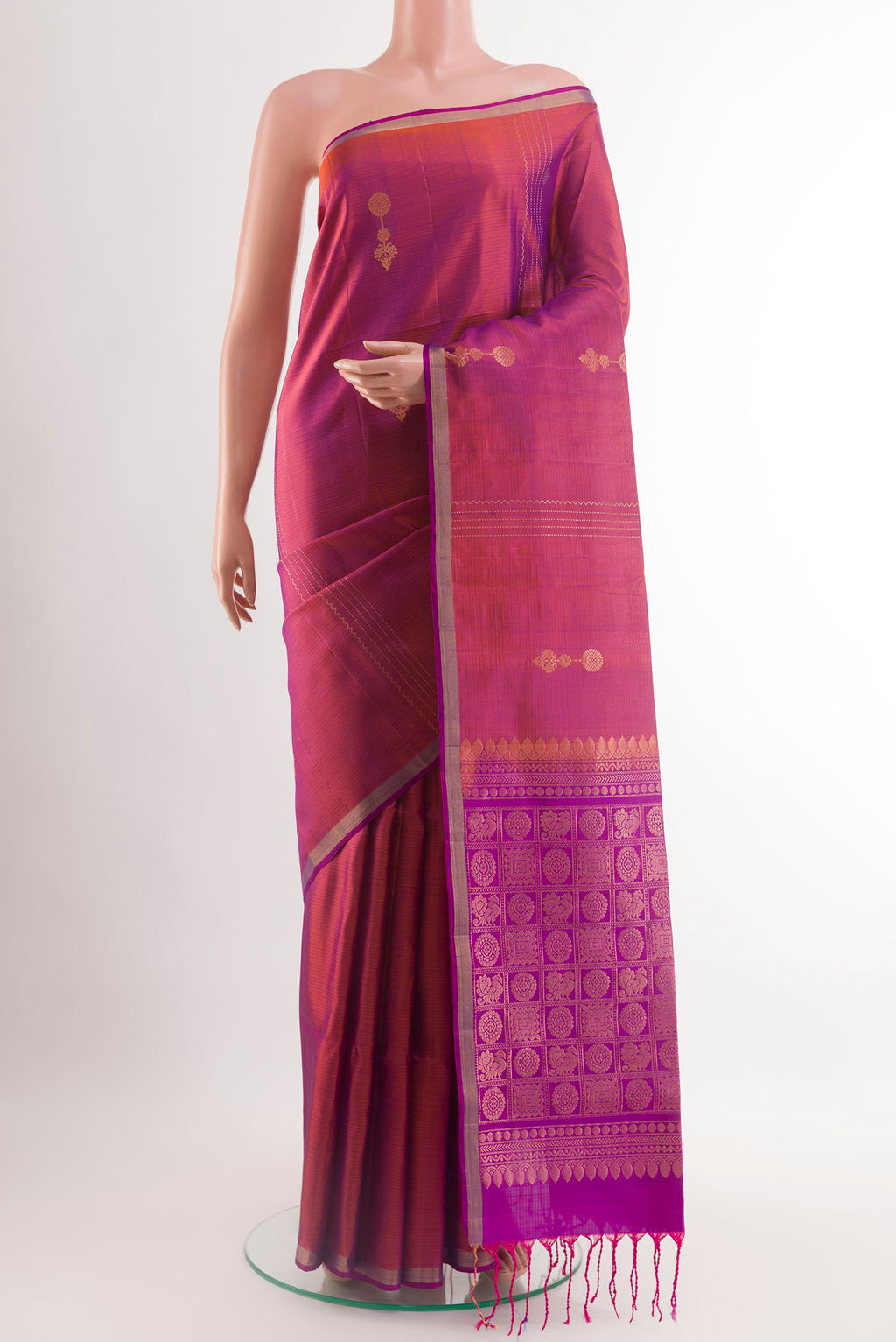Lilac Soft Silk Saree with Zari Butta on the body and Zari Border.  displayed on a mannequin