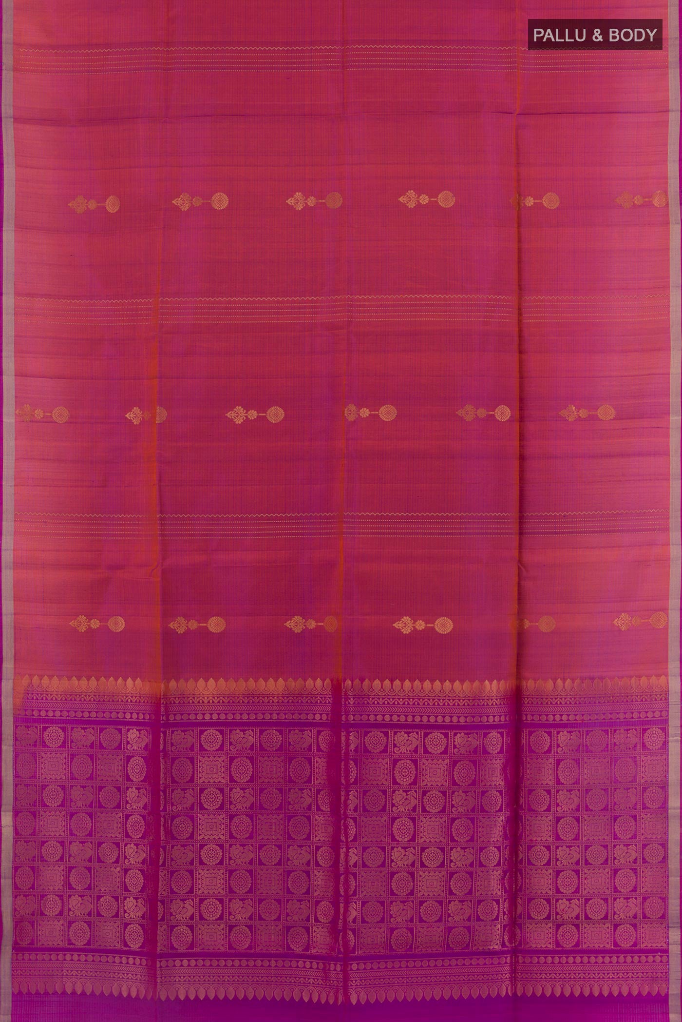 Flat view of Lilac Soft Silk Saree with Zari Butta on the body and Zari Border. 
