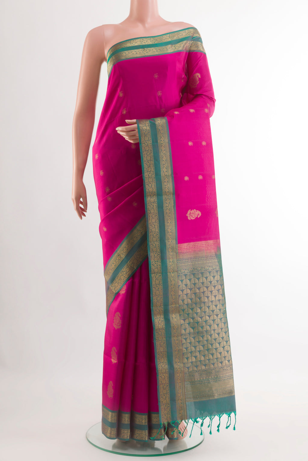 Pink Soft Silk Saree with Zari Butta on the body and Zari Border.  displayed on a mannequin