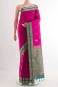 Pink Soft Silk Saree with Zari Butta on the body and Zari Border.  displayed on a mannequin