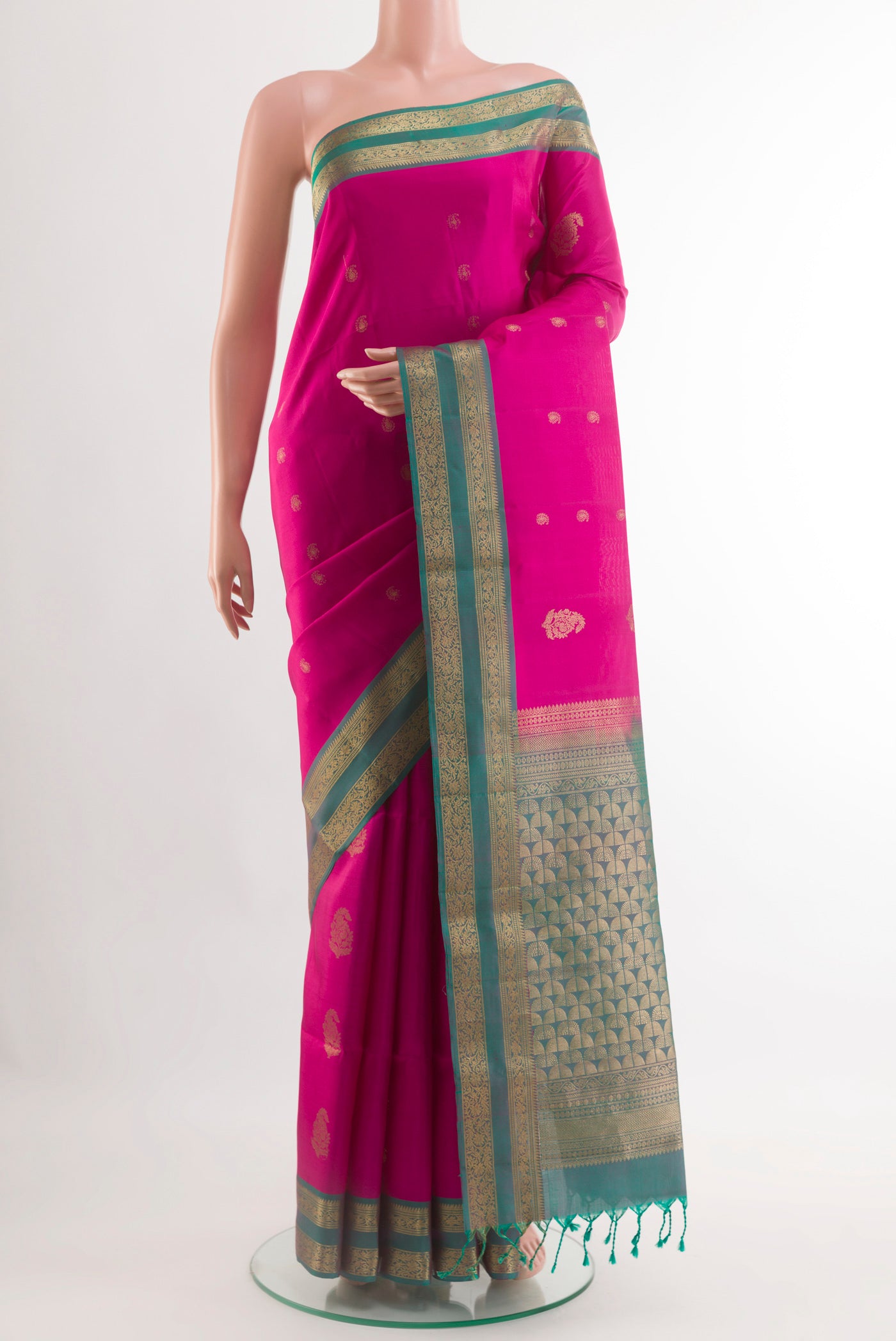 Pink Soft Silk Saree with Zari Butta on the body and Zari Border.  displayed on a mannequin