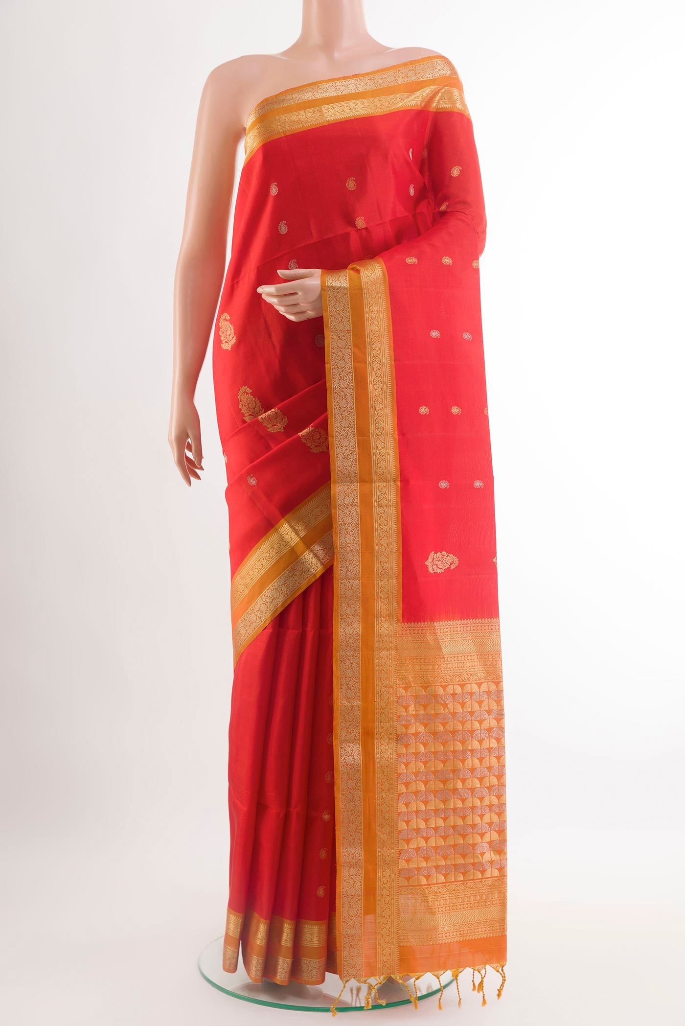 Red Soft Silk Saree with Zari Butta on the body and Zari Border.  displayed on a mannequin