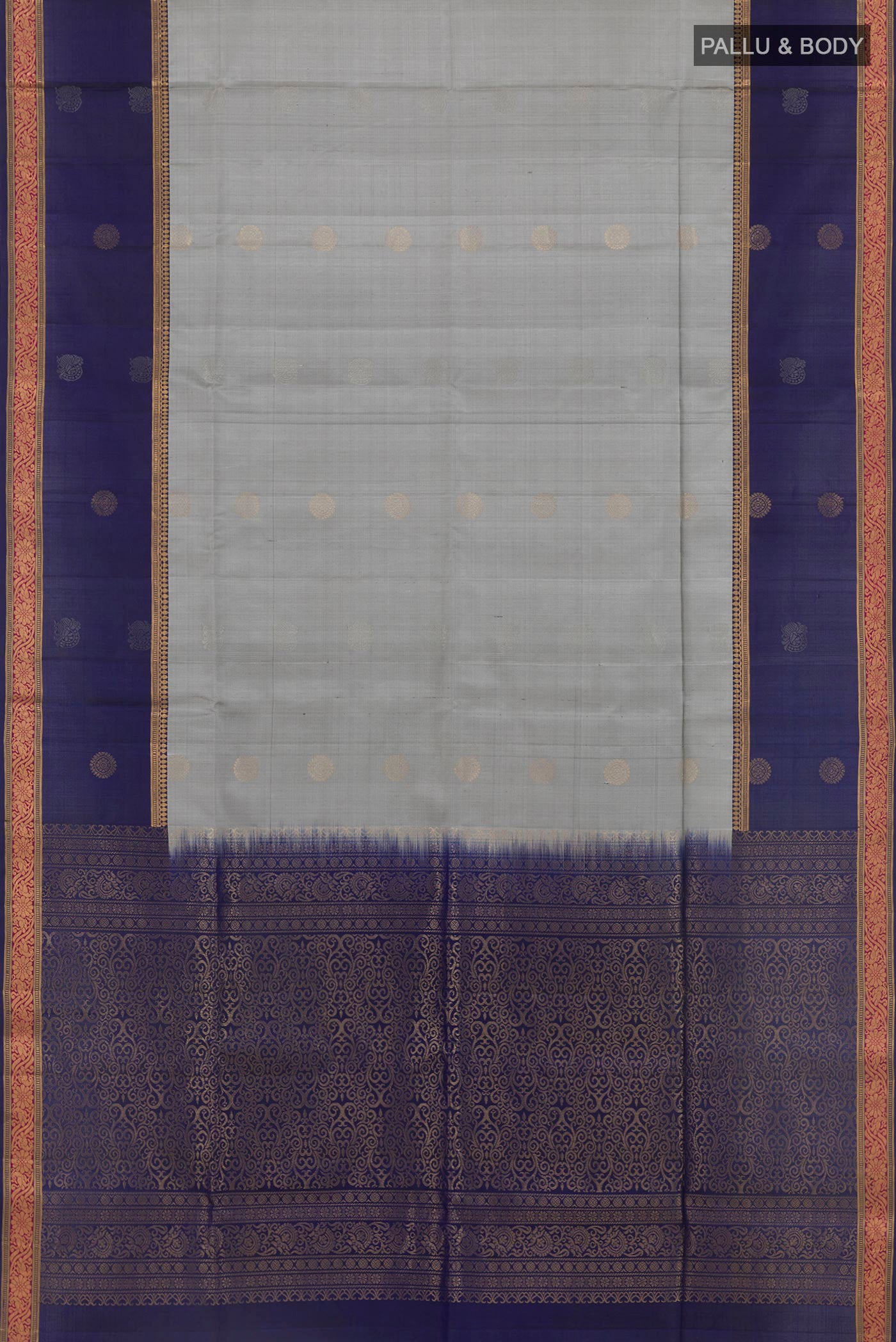 Flat view of Grey Soft Silk Saree with Zari Butta on the body and Zari Border. 