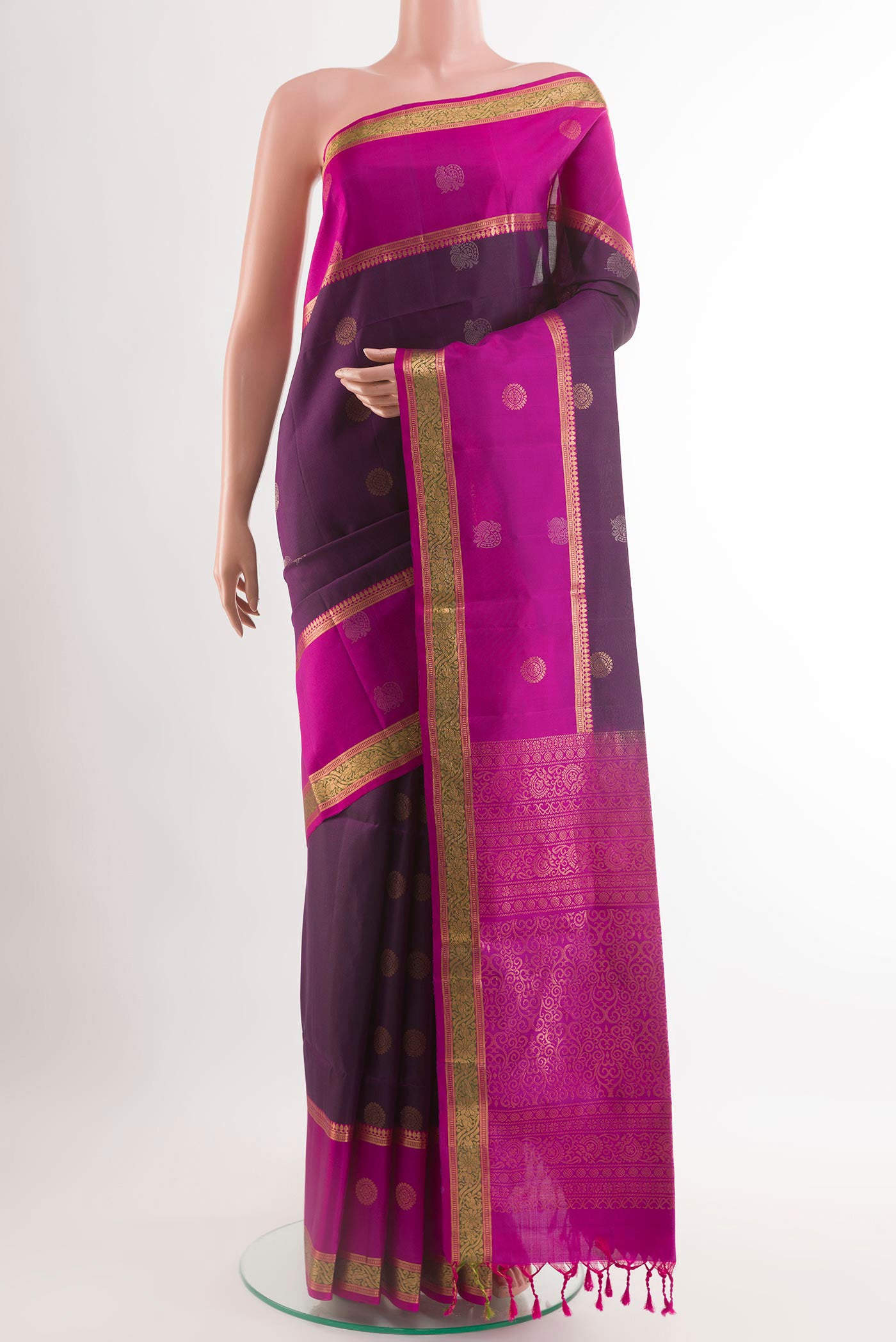 Purple Soft Silk Saree with Zari Butta on the body and Zari Border.  displayed on a mannequin