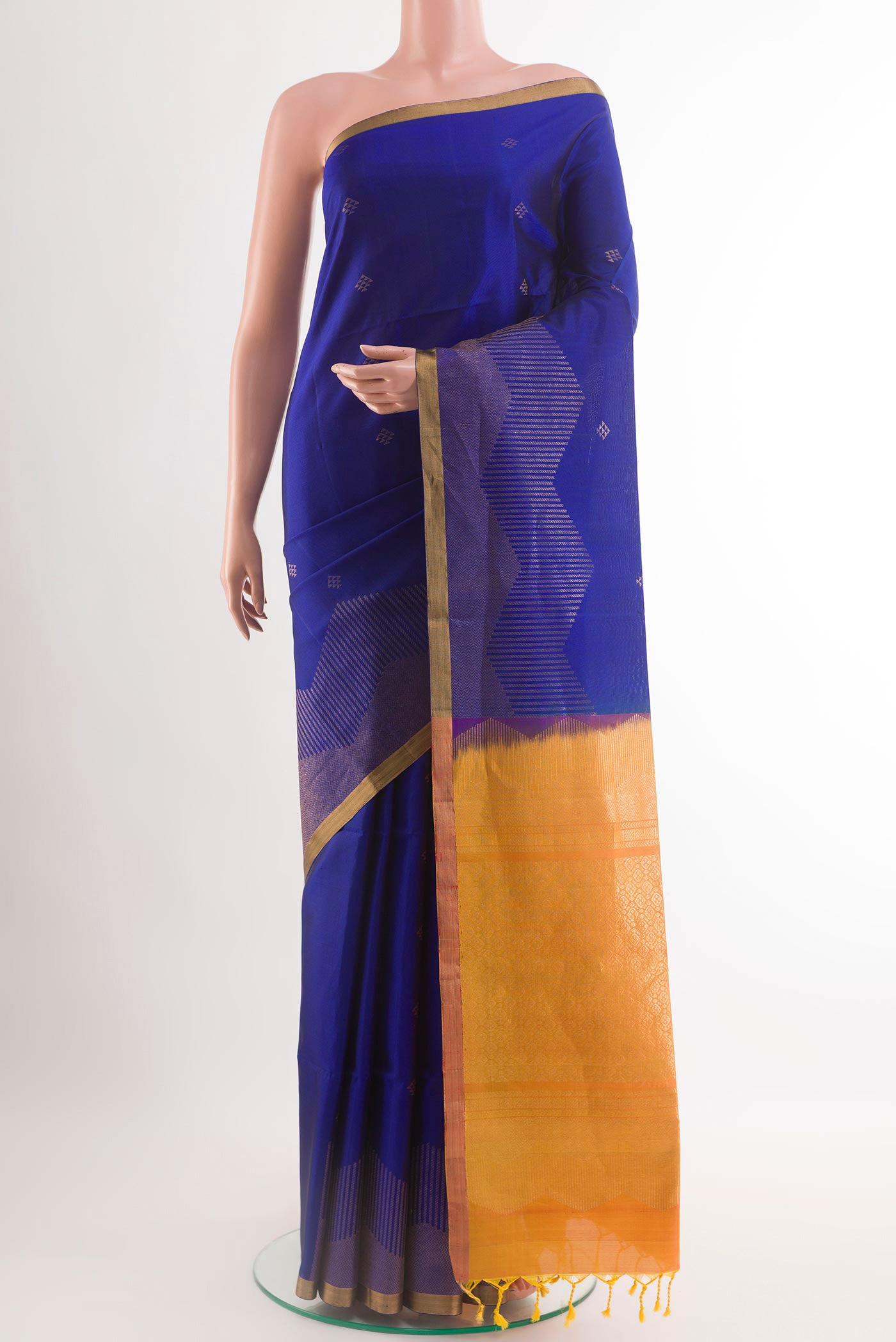 Yellow Soft Silk Saree with Stripes on the body and Zari Border.  displayed on a mannequin