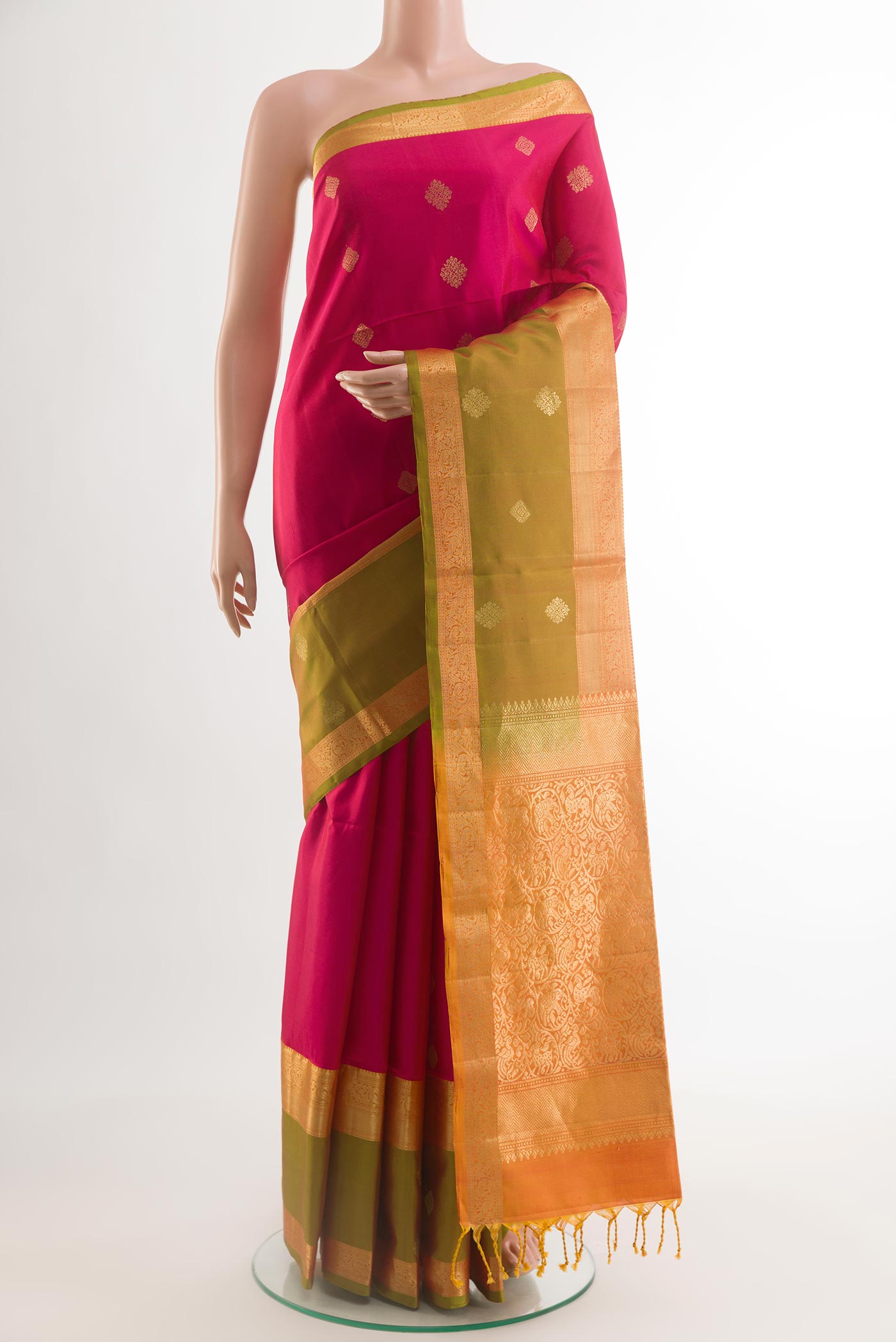 Pink Soft Silk Saree with Zari Butta on the body and Zari Border.  displayed on a mannequin