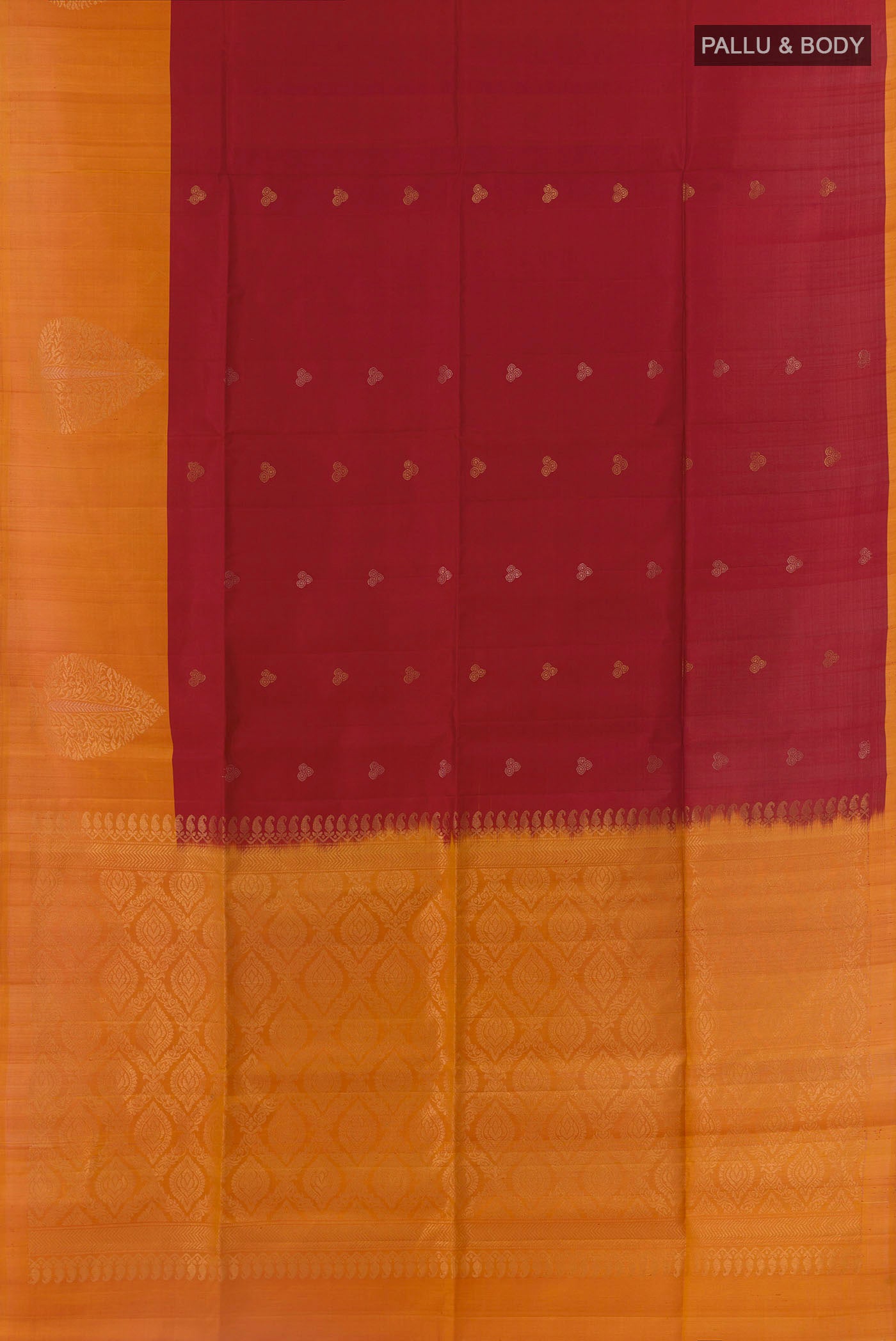 Flat view of Red Soft Silk Saree with Zari Butta on the body and Zari Border. 