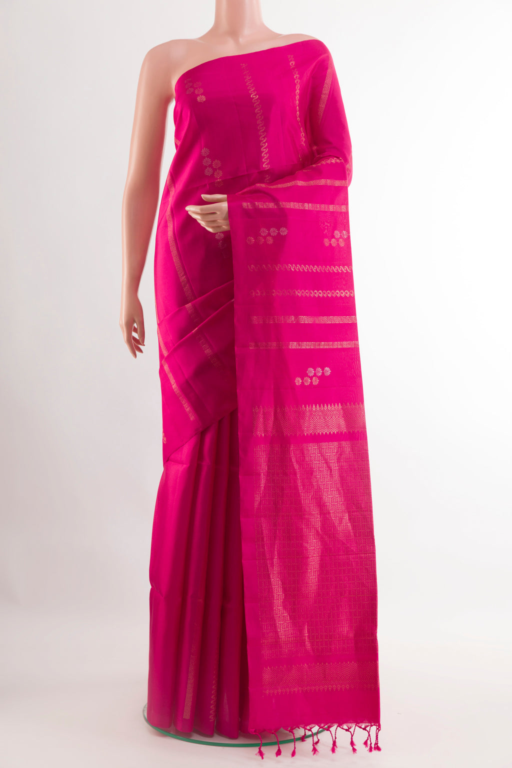 Pink Soft Silk Saree with Zari Butta on the body and Zari Border.  displayed on a mannequin