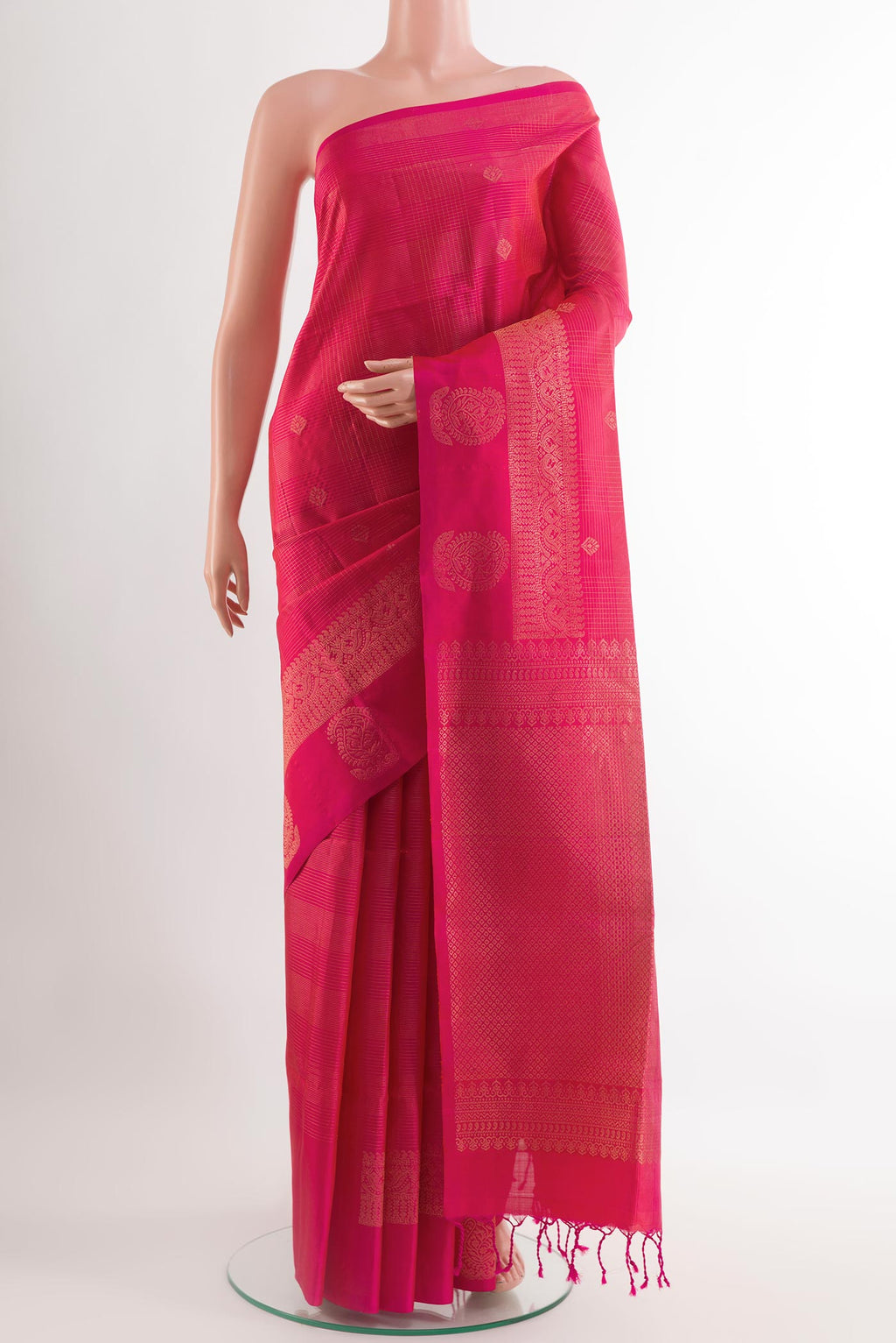Pink Soft Silk Saree with Stripes on the body and Zari Border.  displayed on a mannequin