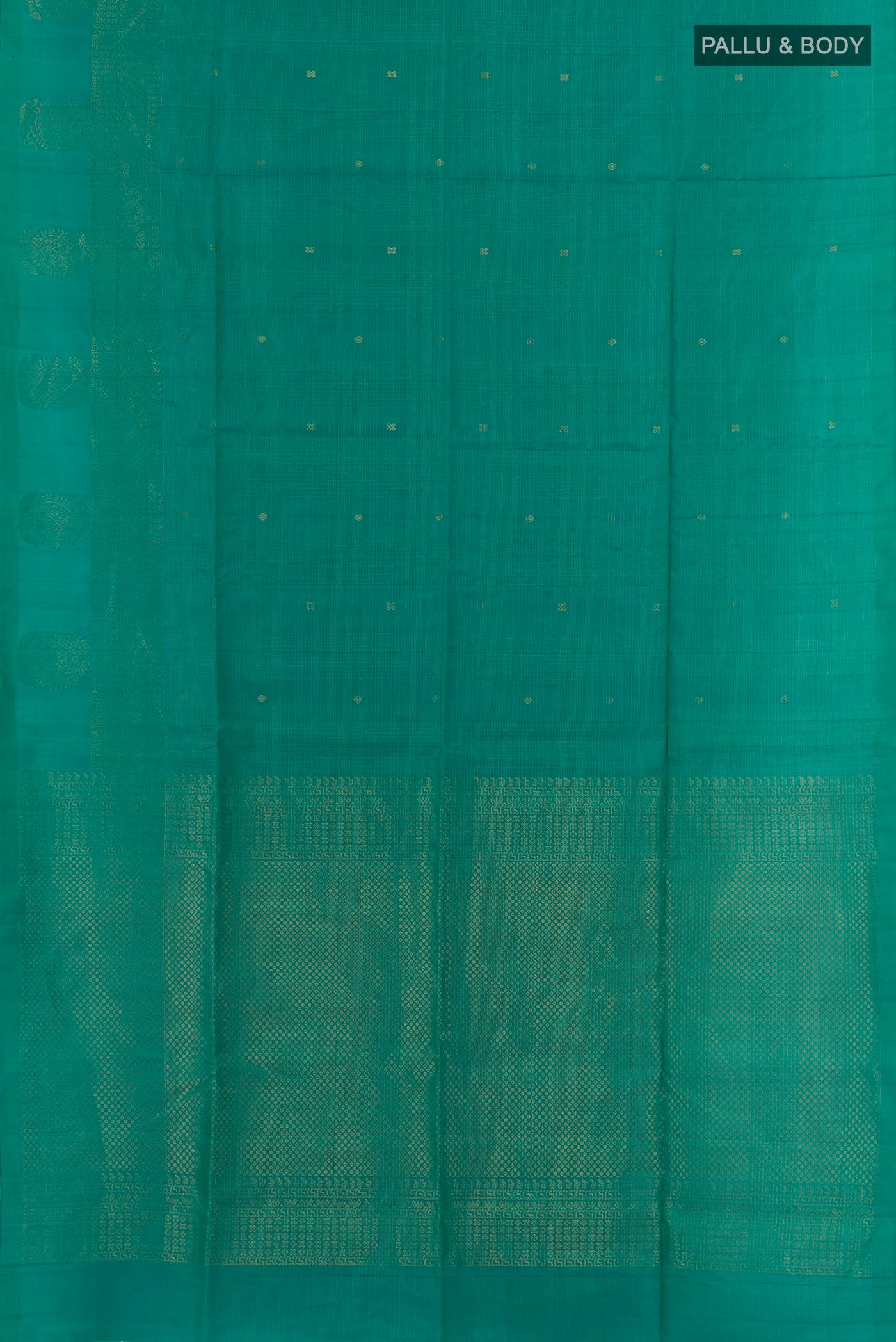 Flat view of Green Soft Silk Saree with Zari Butta on the body and Zari Border. 