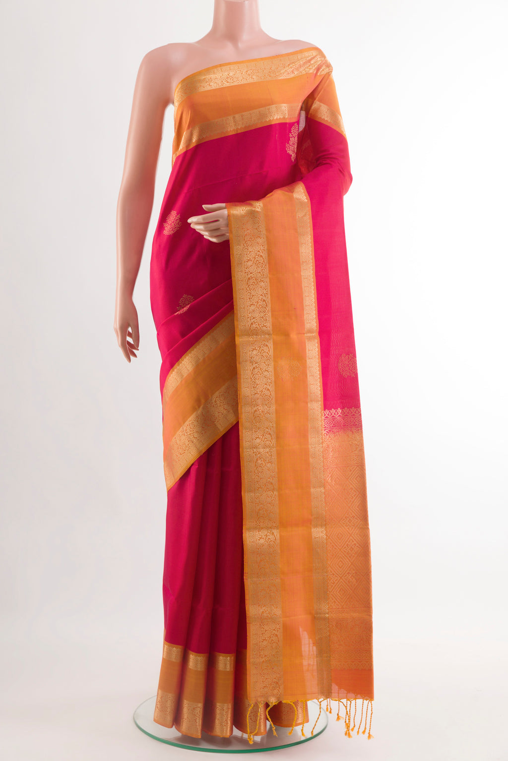 Red Soft Silk Saree with Zari Butta on the body and Zari Border.  displayed on a mannequin
