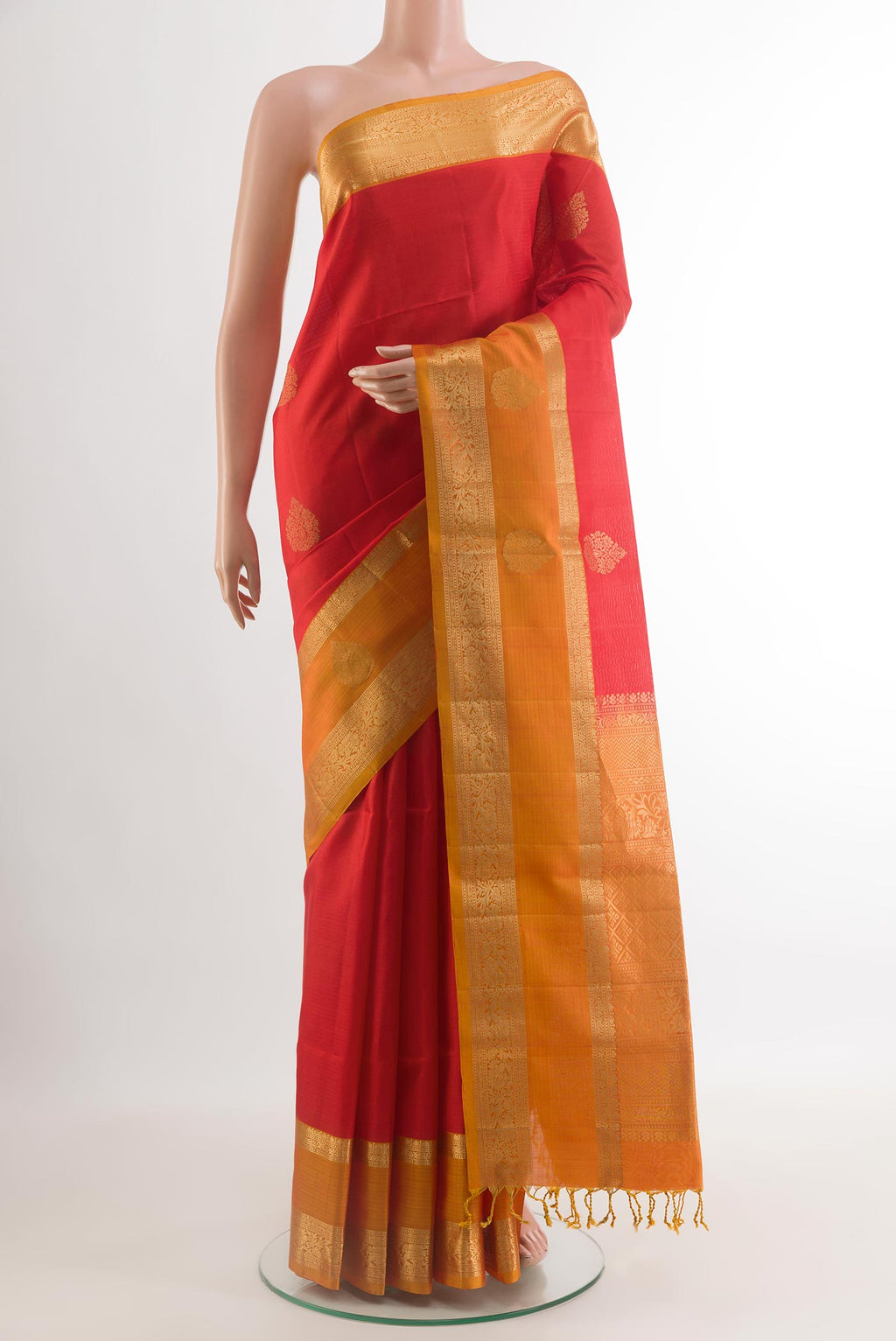 Red Soft Silk Saree with Zari Butta on the body and Zari Border.  displayed on a mannequin
