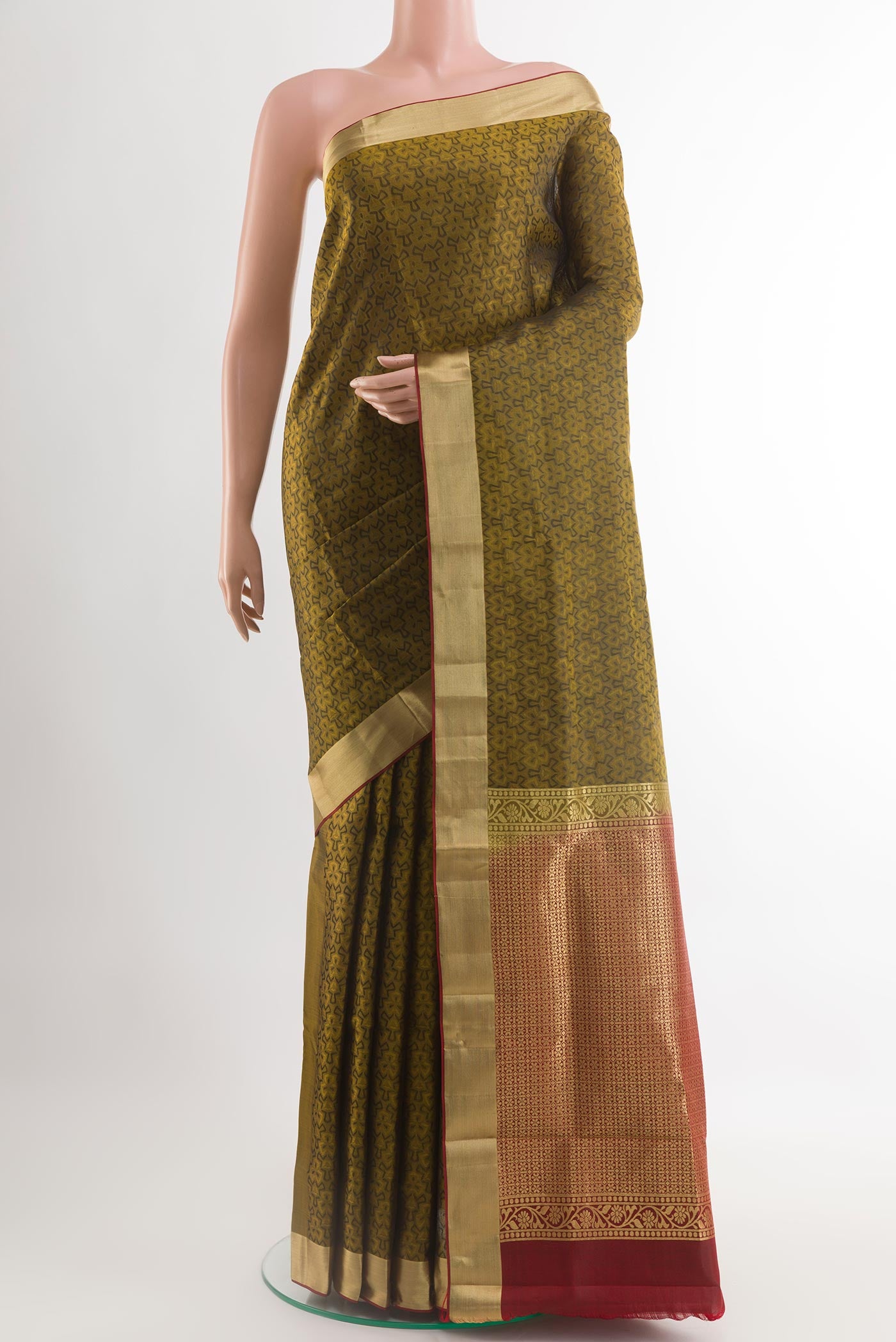 Mehandi Green Kanjivaram Silk Saree with Jacquard design on the body and Zari Border.  displayed on a mannequin