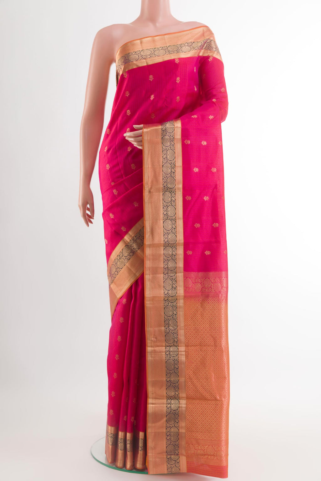 Pink Kanchipuram Silk Saree with Jacquard With Zari Butta on the body and Zari Border.  displayed on a mannequin