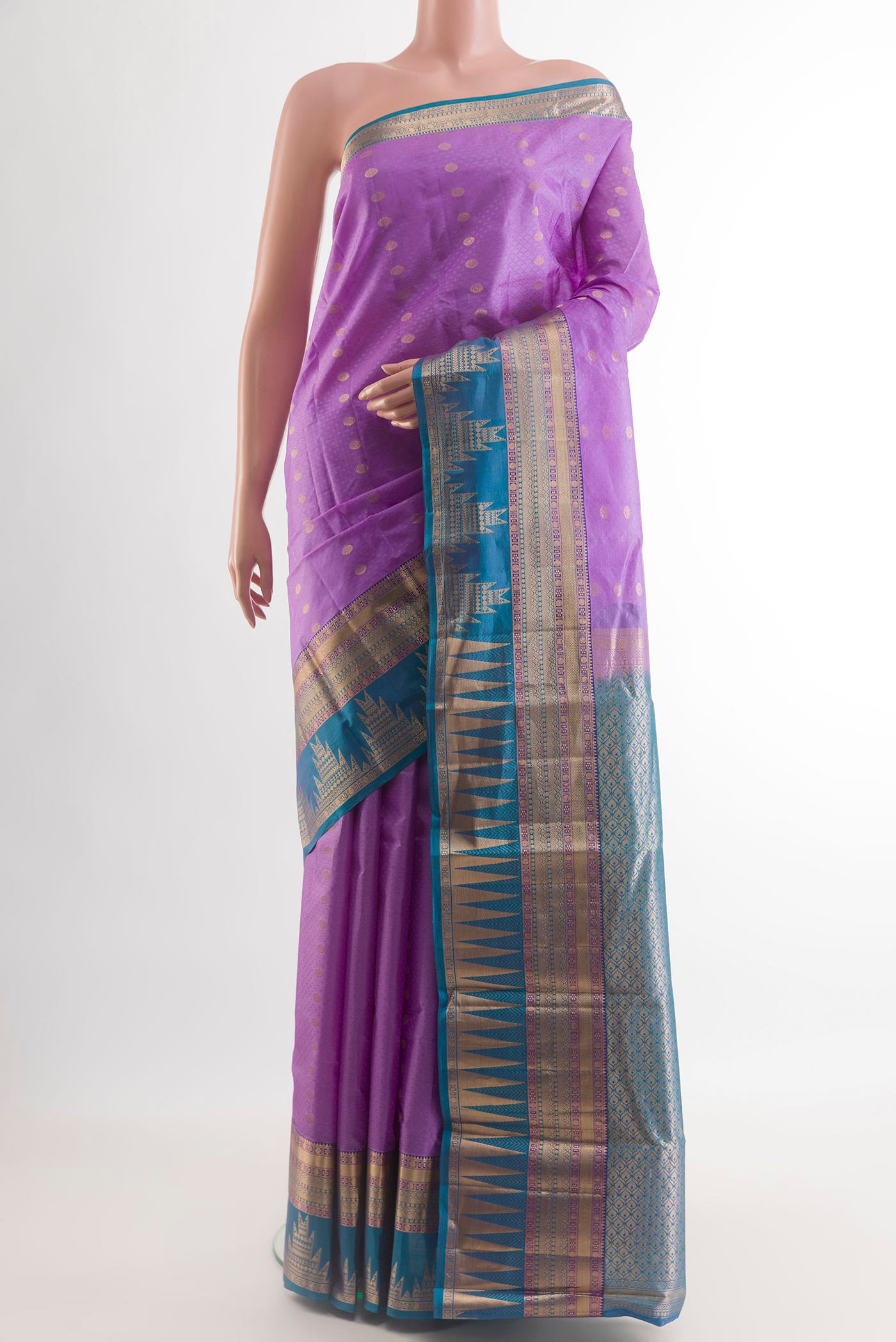 Lavender Kanchipuram Silk Saree with Jacquard With Zari Butta on the body and Zari Border.  displayed on a mannequin