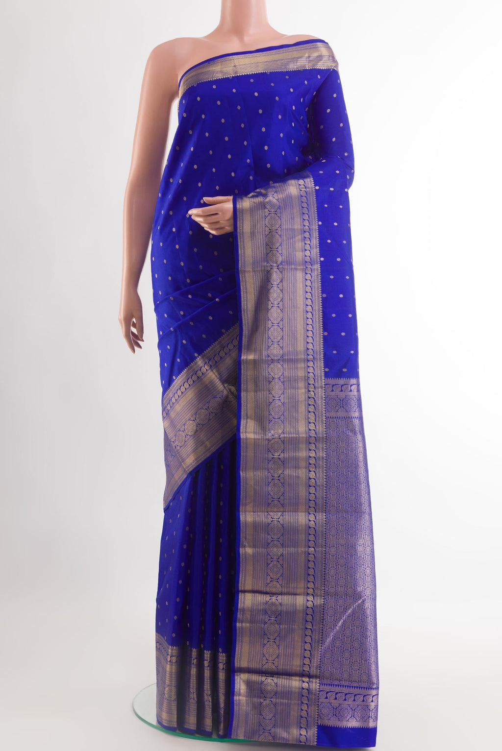 Blue Kanchipuram Silk Saree with Zari Butta on the body and Zari Border.  displayed on a mannequin