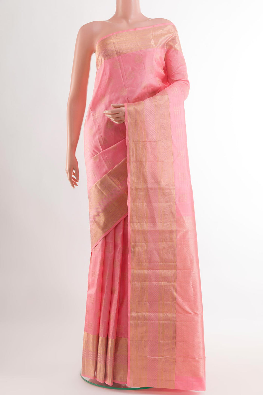 Pink Kanjivaram Silk Saree with Zari Butta on the body and Zari Border.  displayed on a mannequin