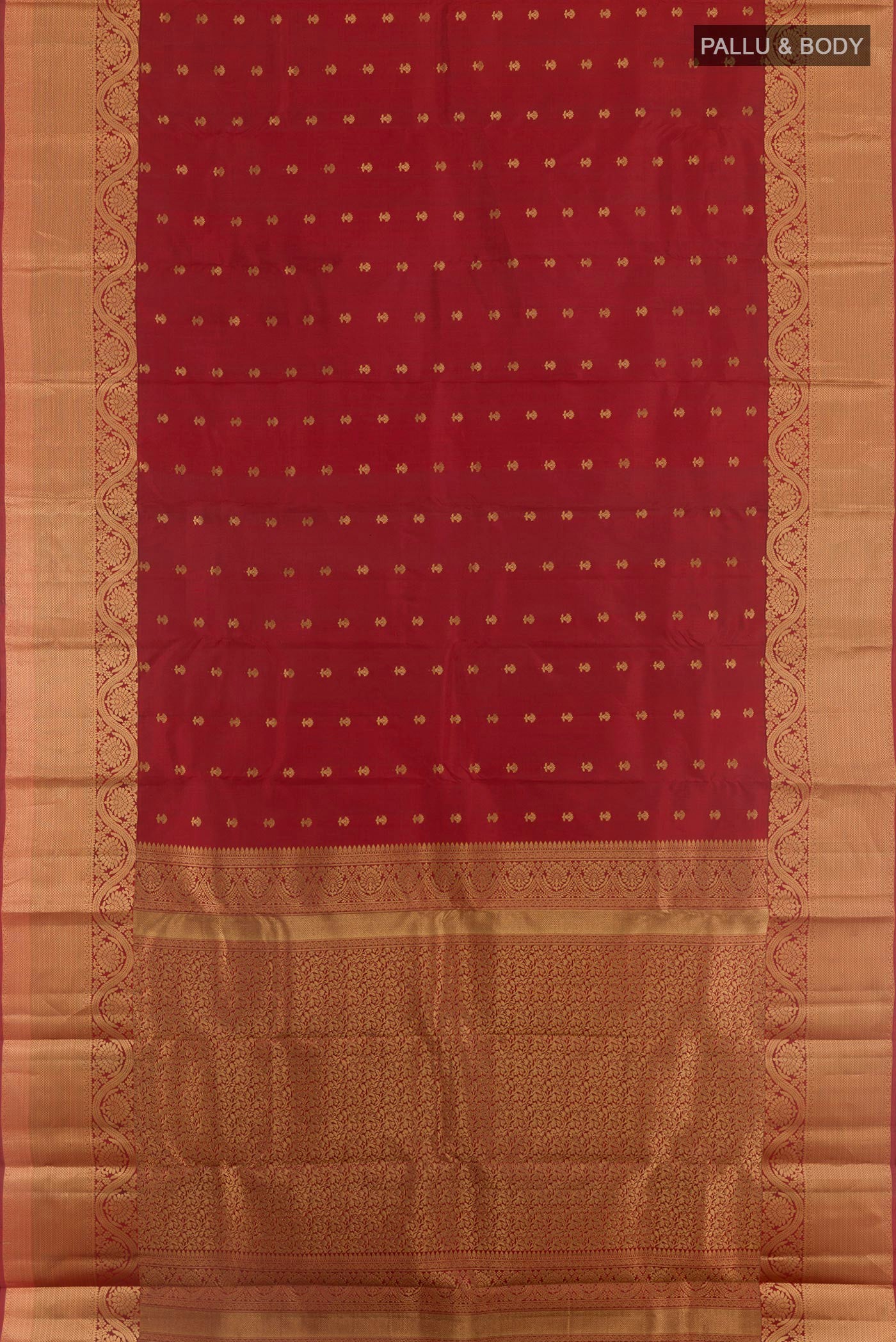 Flat view of Maroon Kanchipuram Silk Saree with Zari Butta on the body and Zari Border. 