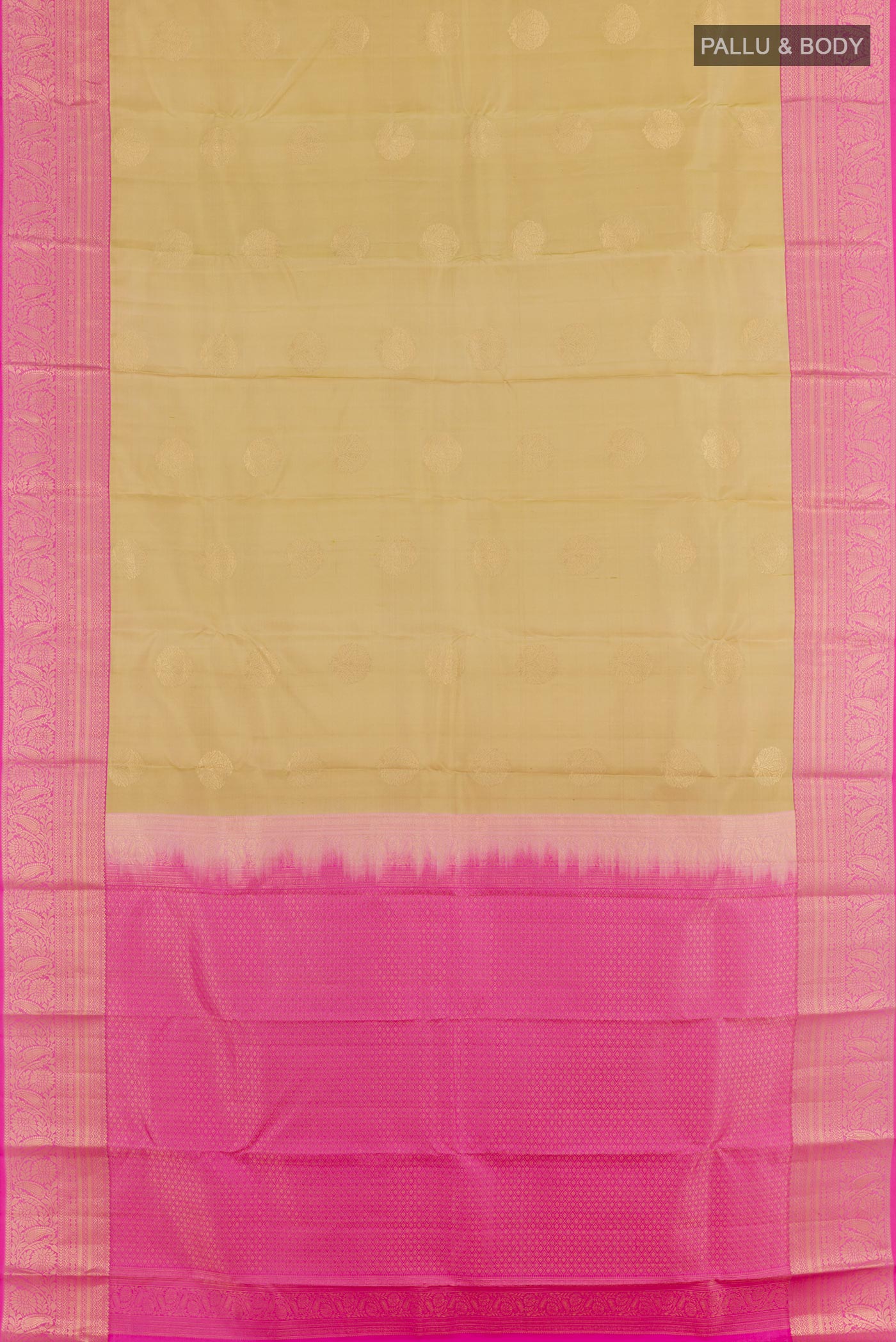 Flat view of Beige Kanjivaram Silk Saree with Zari Butta on the body and Zari Border. 