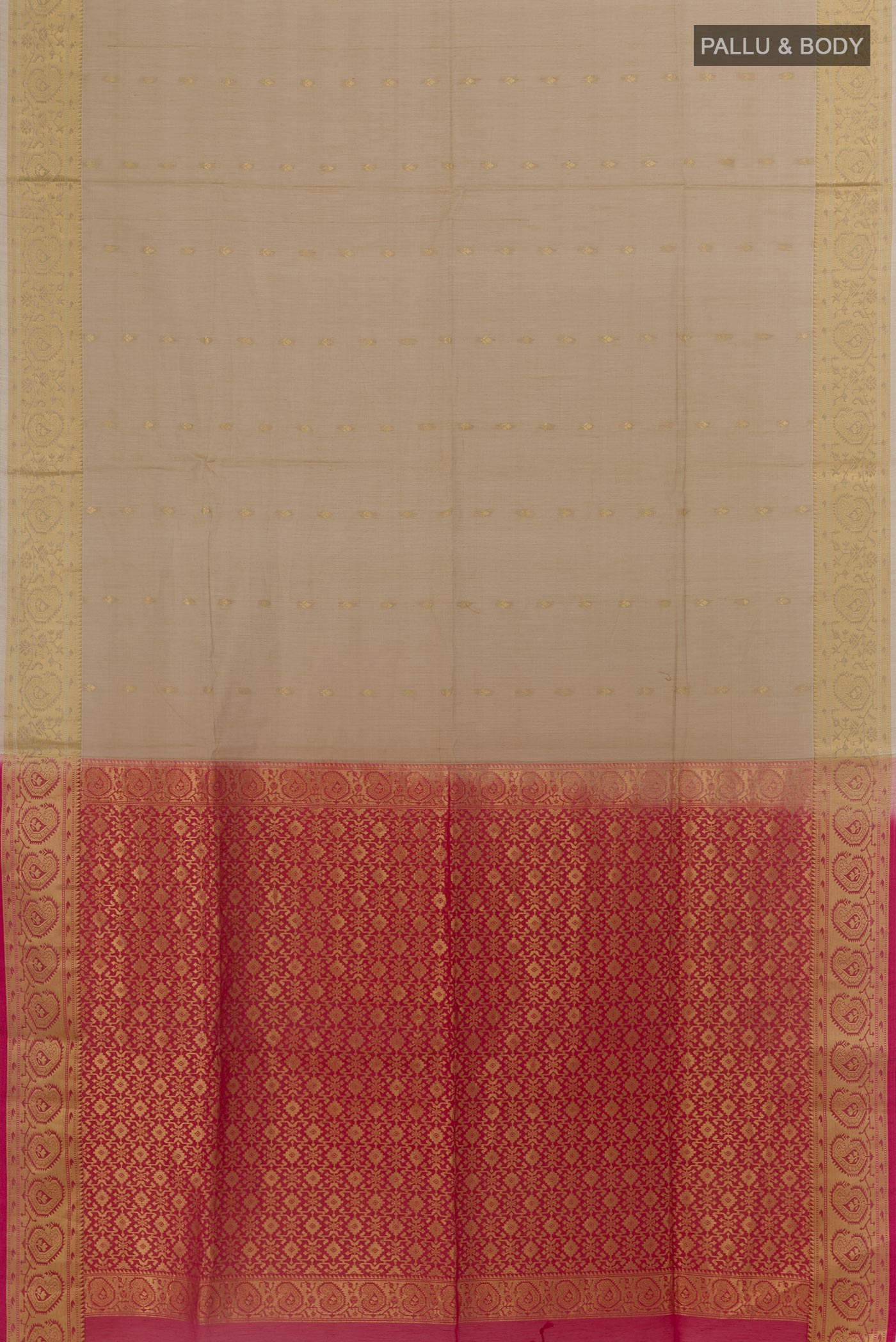 Flat view of Beige Silk Cotton Saree with Zari Butta on the body and Zari Border. 