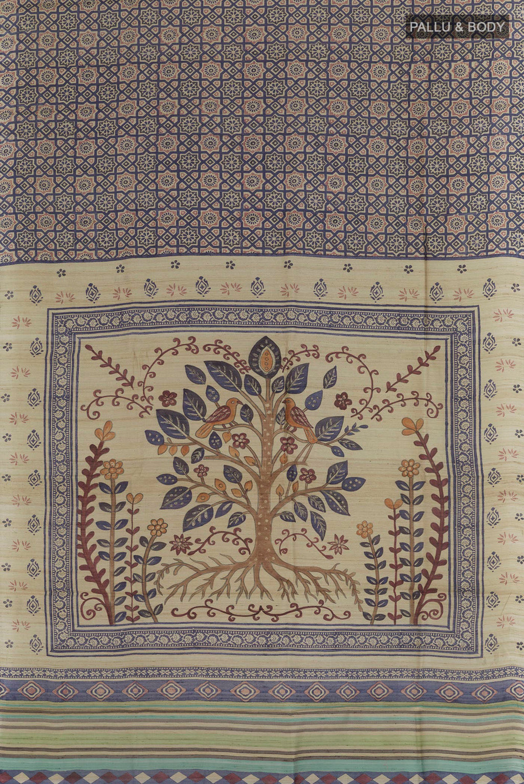 Flat view of Beige Tussar Saree with Printed design on the body and Printed Border. 