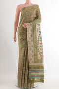 Green Tussar Saree with Printed design on the body and Embroidery Border.  displayed on a mannequin