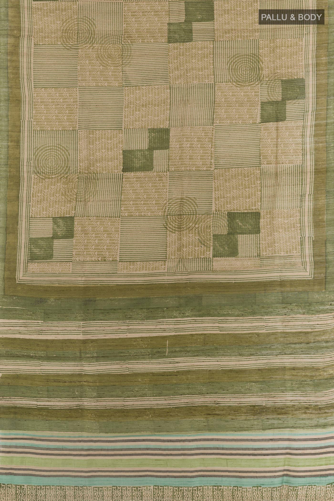 Flat view of Green Tussar Saree with Printed design on the body and Printed Border. 