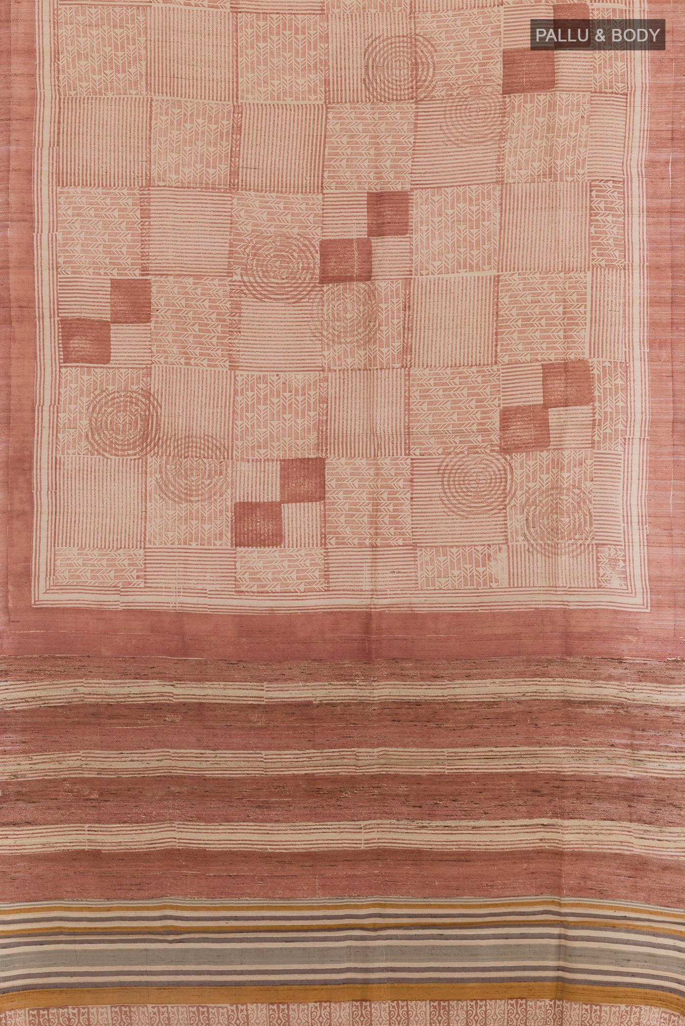 Flat view of Brown Tussar Saree with Printed design on the body and Printed Border. 