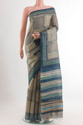 Blue Tussar Saree with Printed design on the body and Printed Border.  displayed on a mannequin