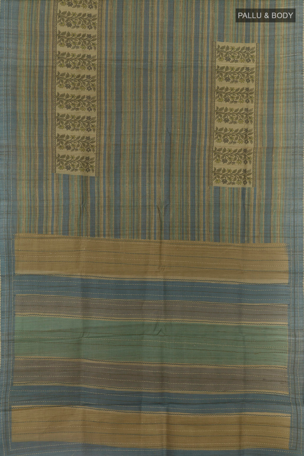 Flat view of Blue Tussar Saree with Printed design on the body and Zari Border. 